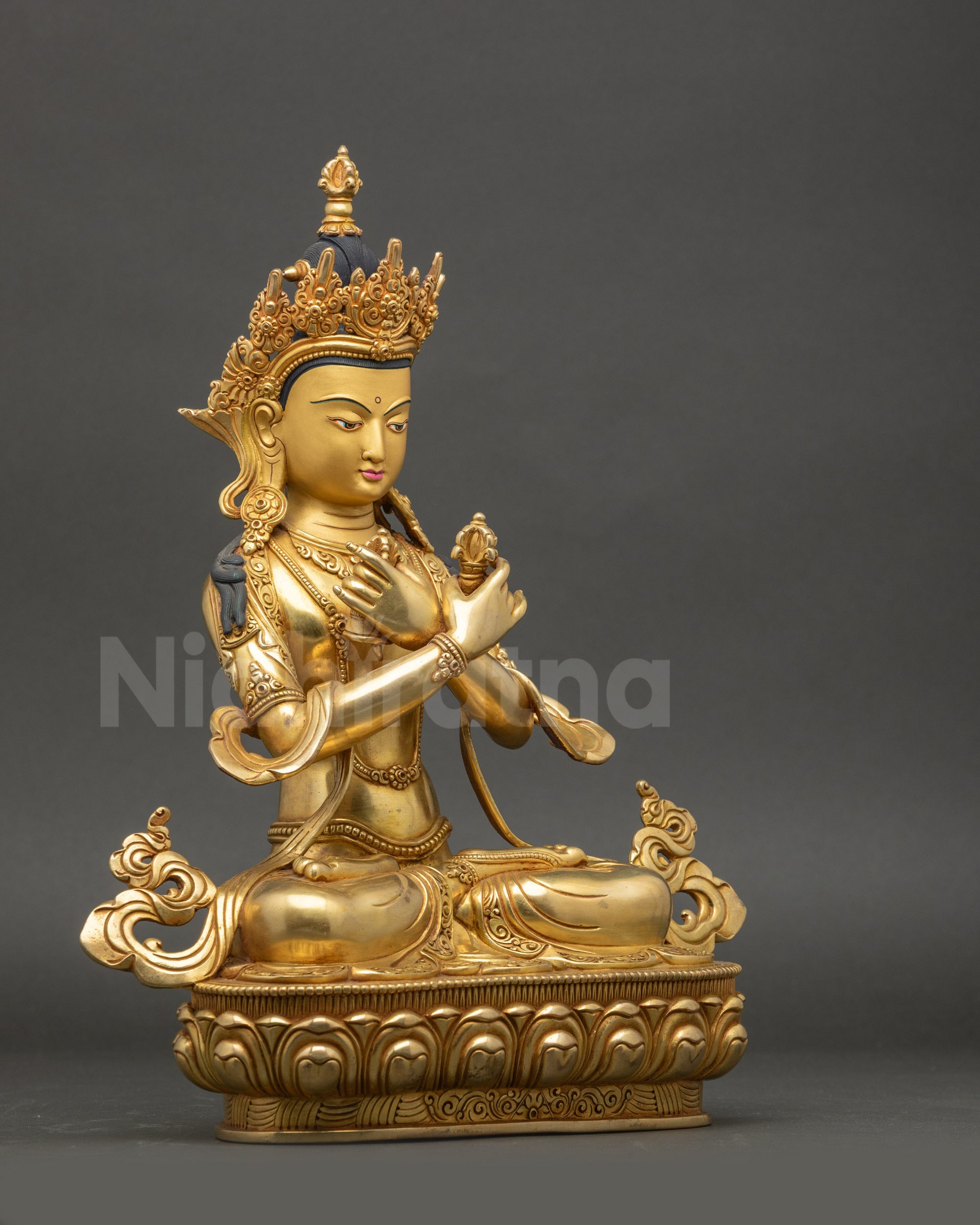 Vajradhara Buddha statue arms-crossed holding vajra and bell gold finish