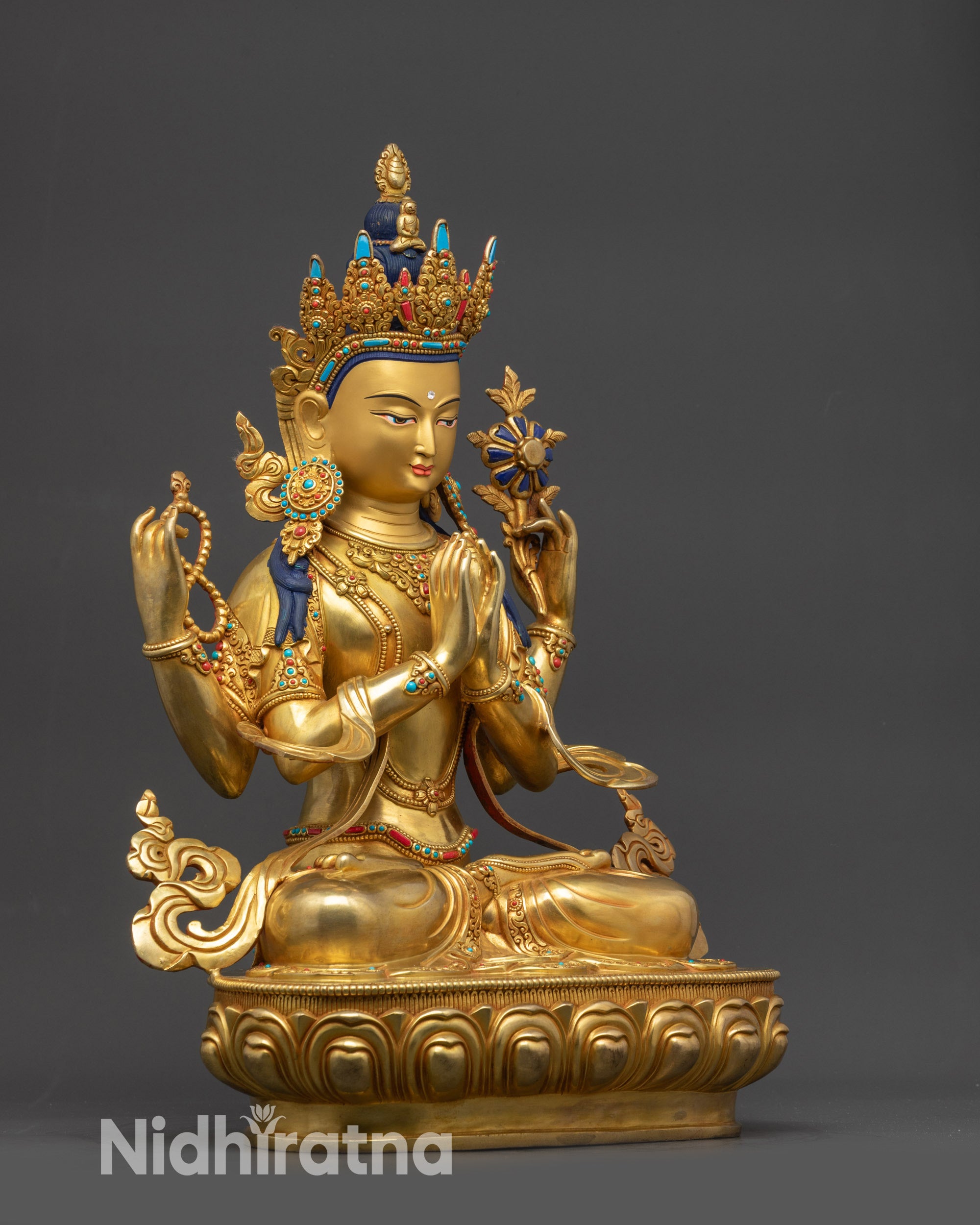 Side close up face of Chenrezig Buddha showing calm meditation features