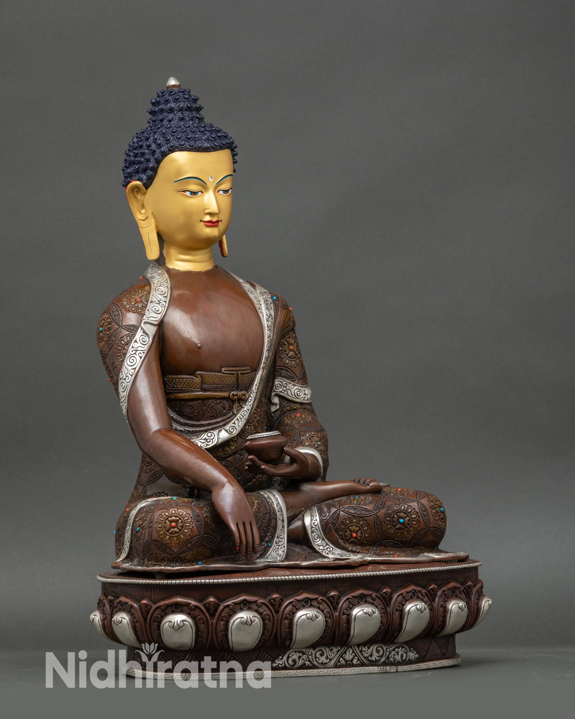 Side view of Nepalese copper Buddha statue for home altar and sacred space meditation