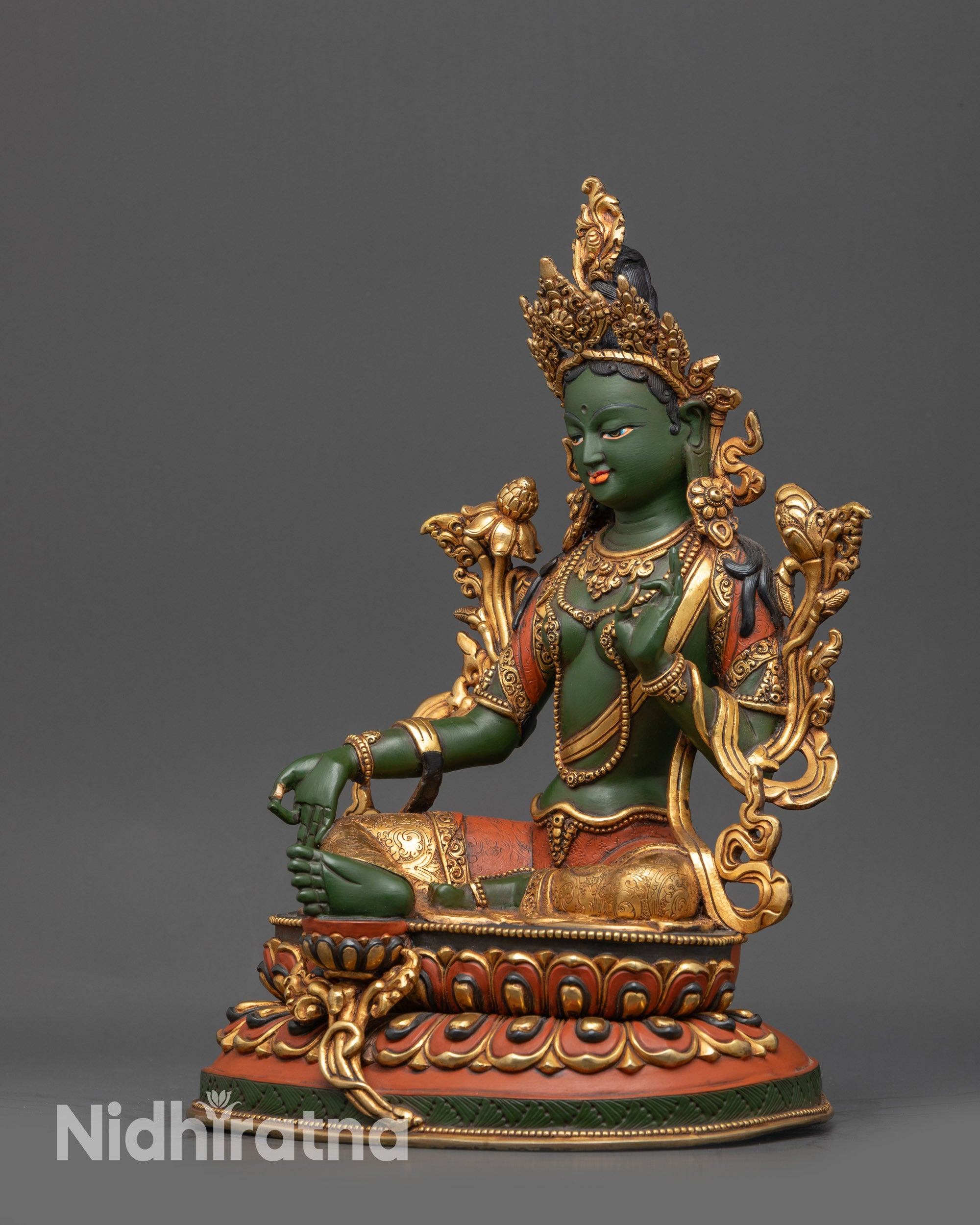 Back view Green Tara Statue highlighting gold-plated robe and intricate carvings