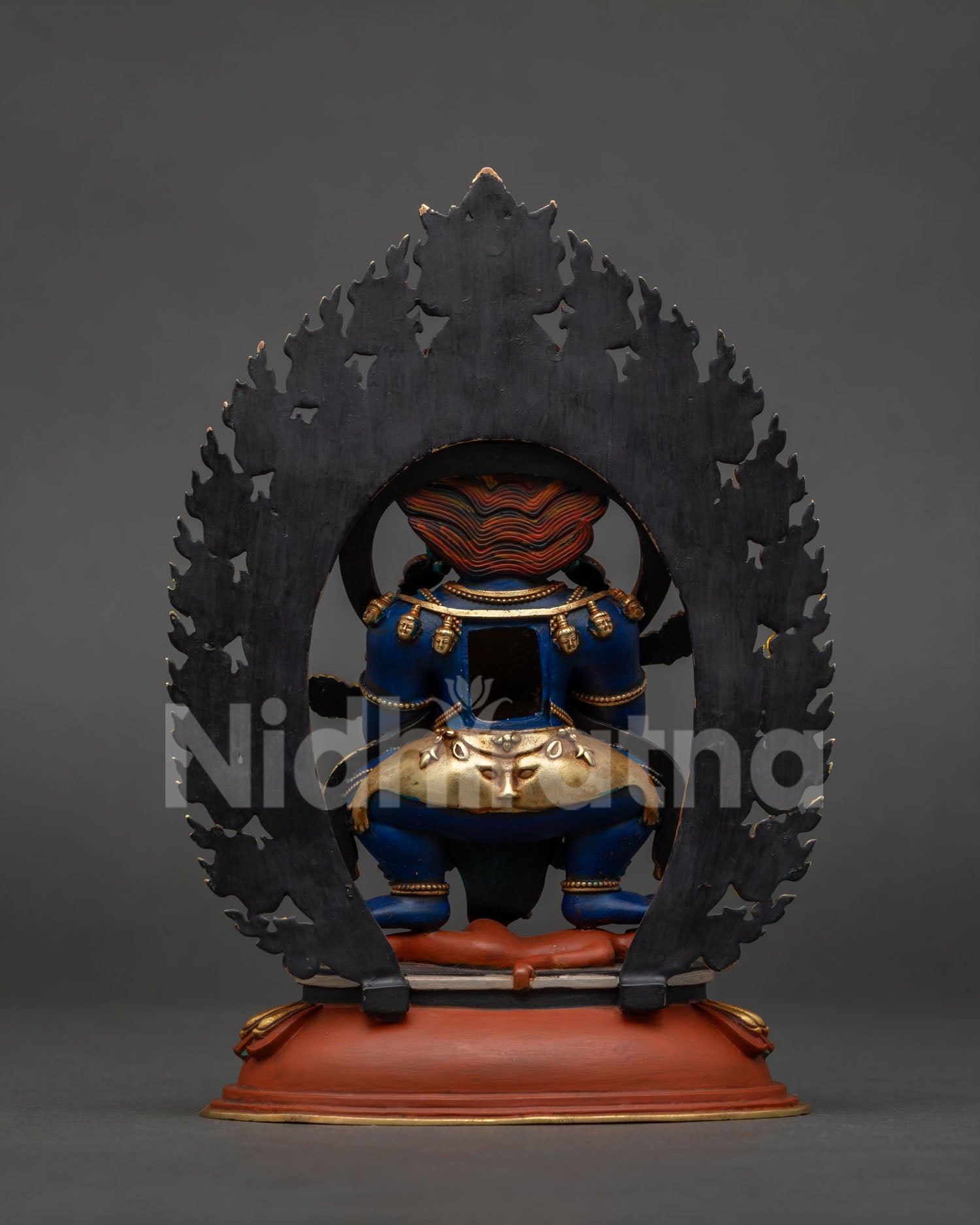 Sakya Mahakala statue back view showing handcrafted gold gilded copper details