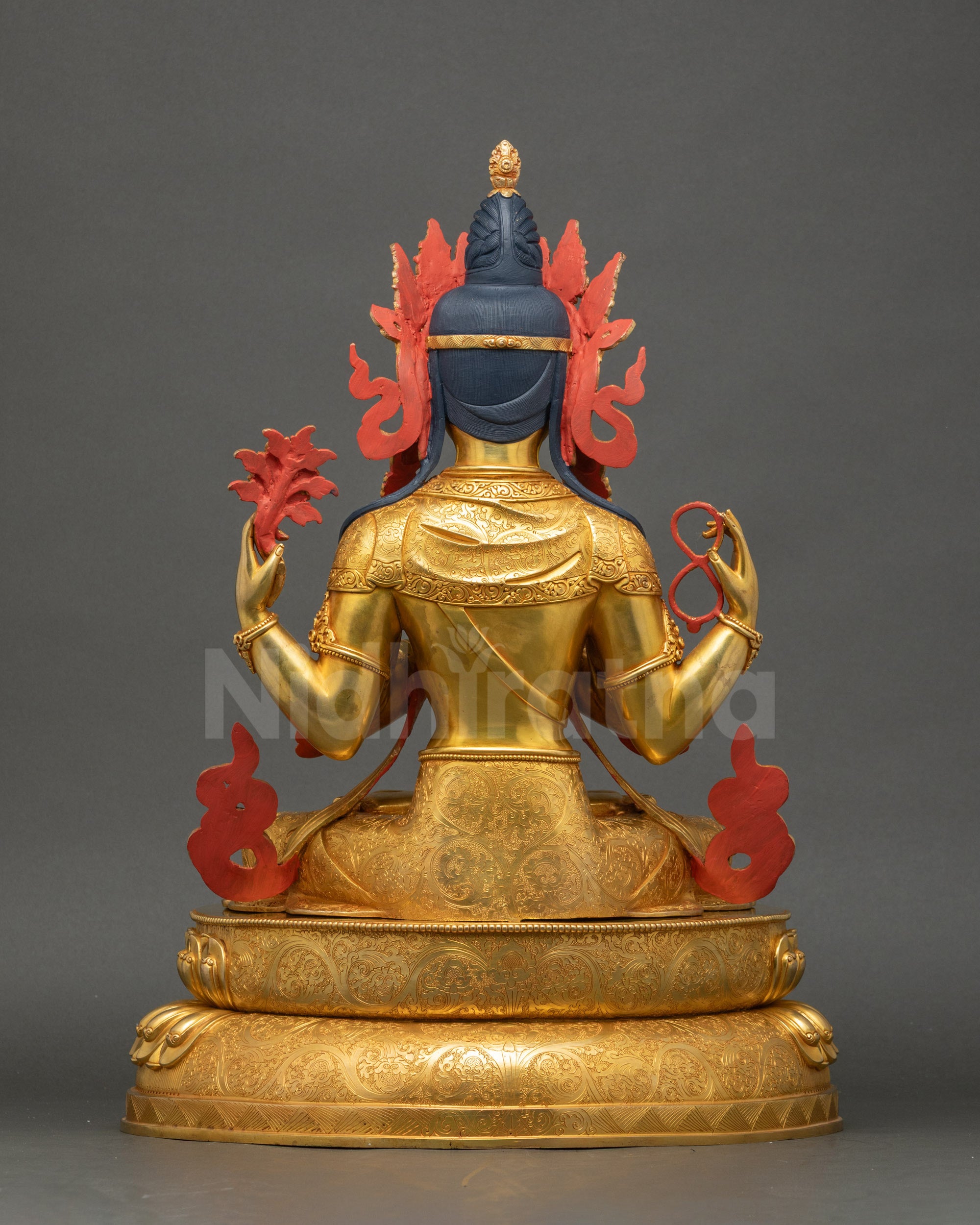 Chenrezig statue back view detailed carvings and flowing robes