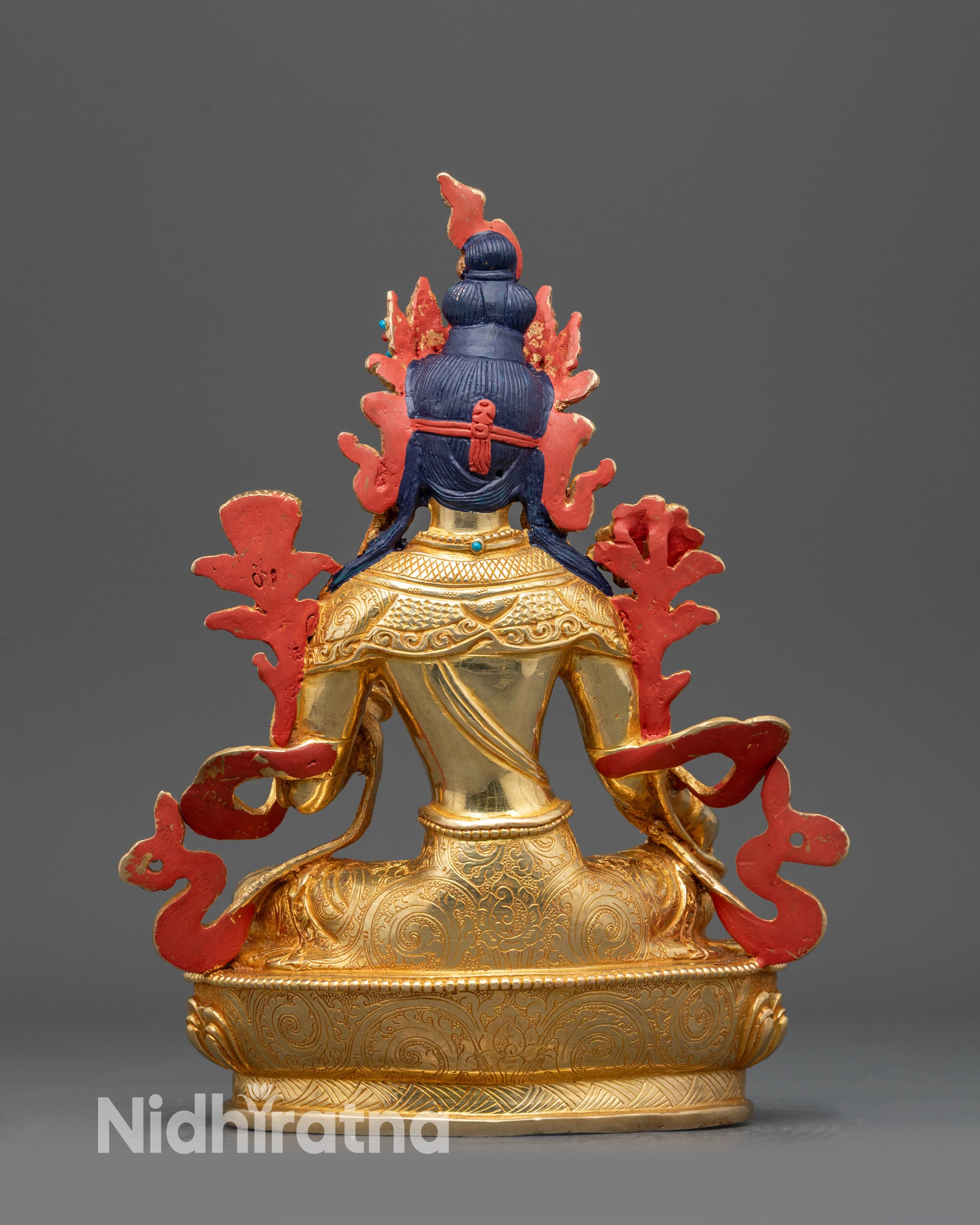 Back view Green Tara statue showing detailed robe patterns and fire-gilded finish