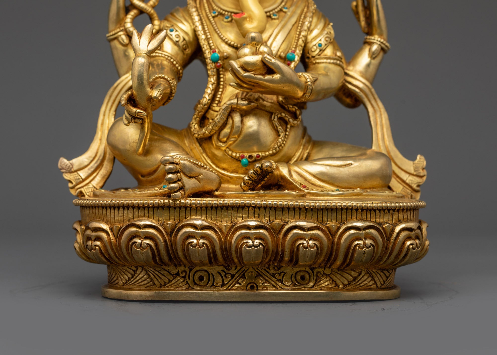 Four-armed Ganesha Statue | Spiritual Idol Crafted for Sacred Spaces