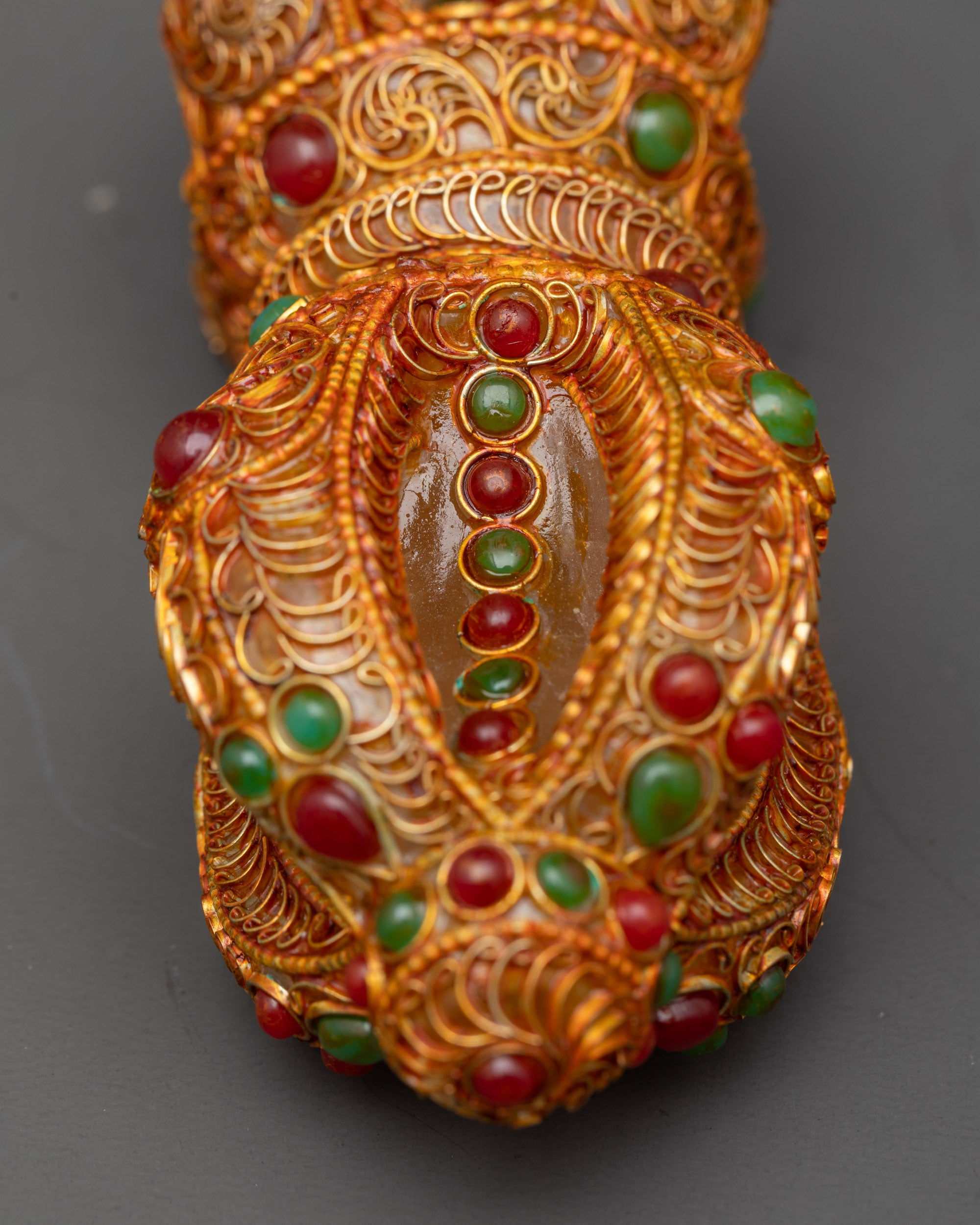 Back view Copper Dorje highlighting lotus-like ends and intricate metalwork