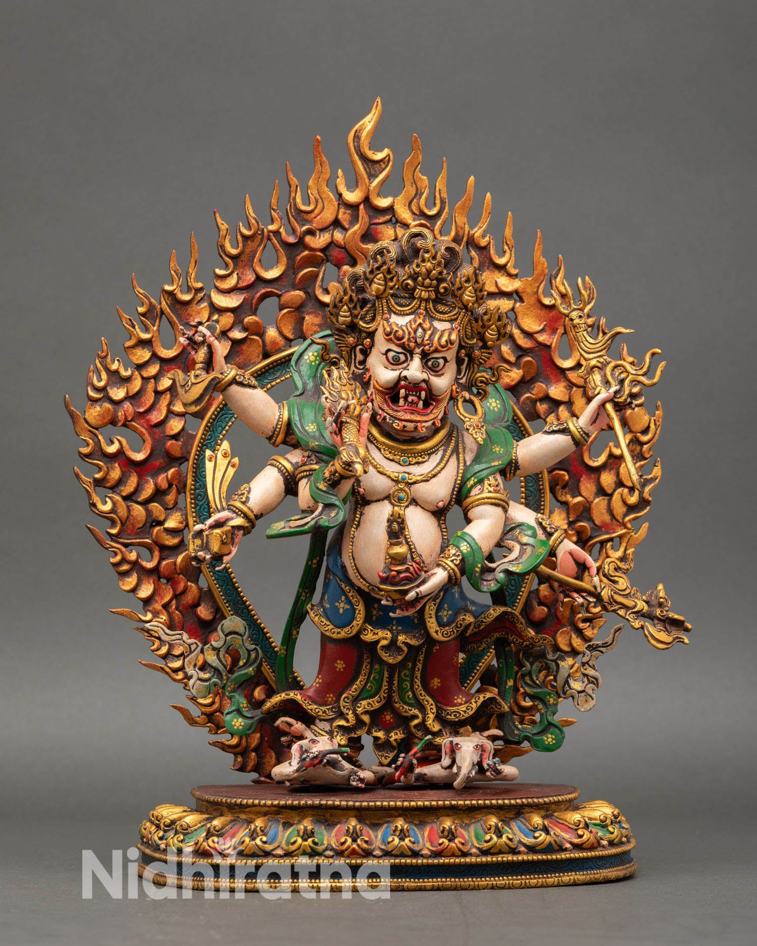 Front view of White Mahakala statue six arms lotus seat gold gilded hand painted details