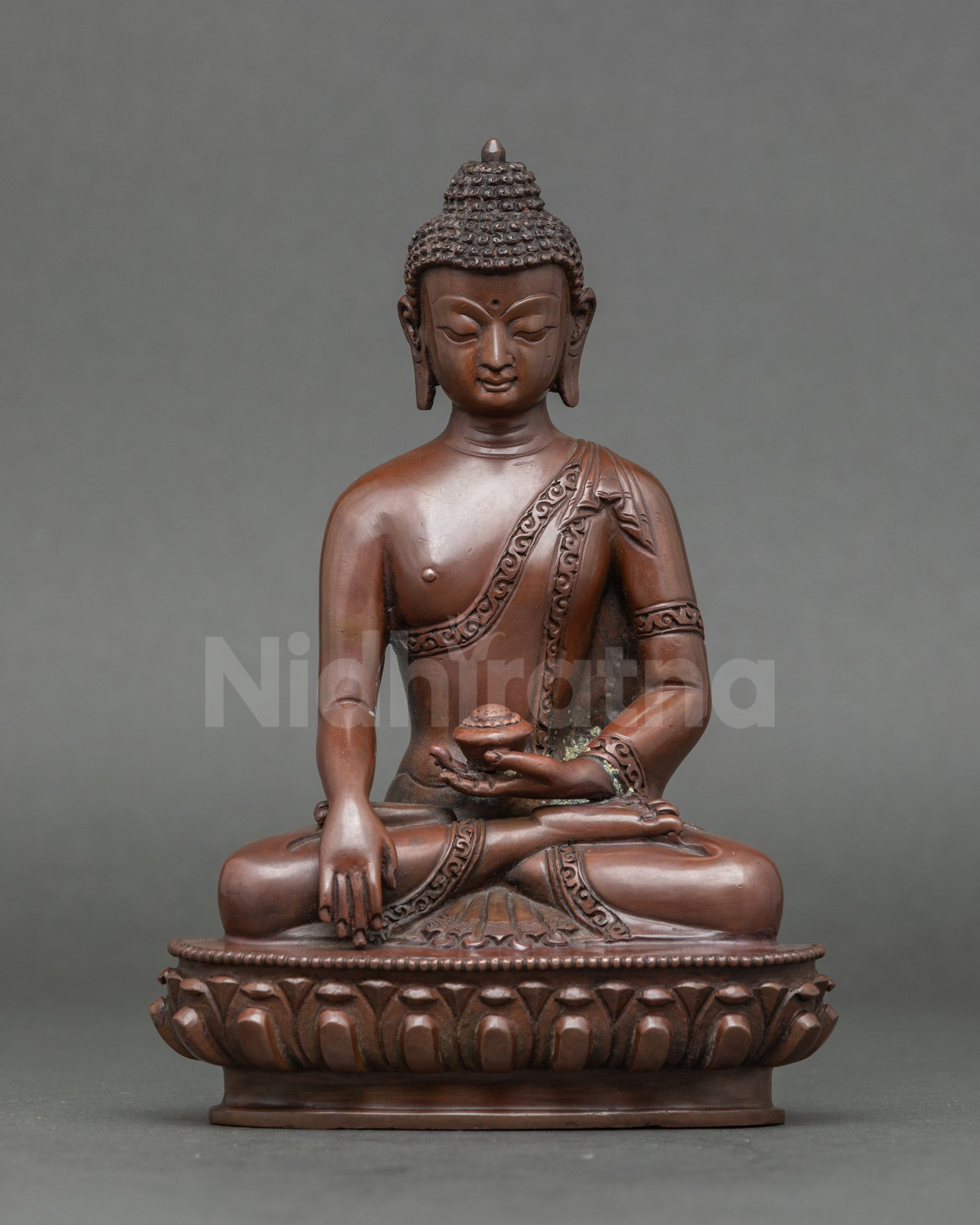 Front view Shakyamuni Buddha statue in oxidized copper, Bhumisparsha mudra