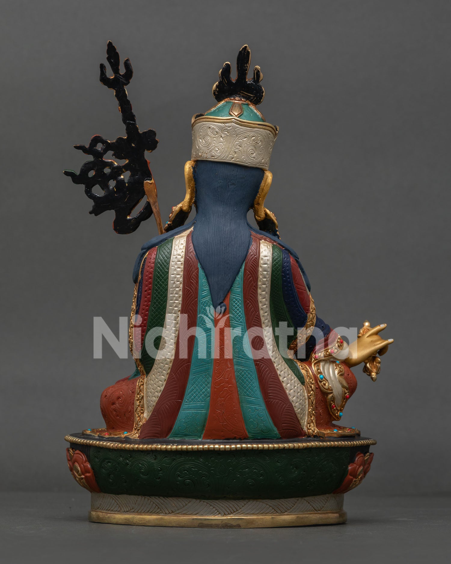 Guru Rinpoche Statue back view revealing handcrafted robes, lotus throne, and Newari metal artistry