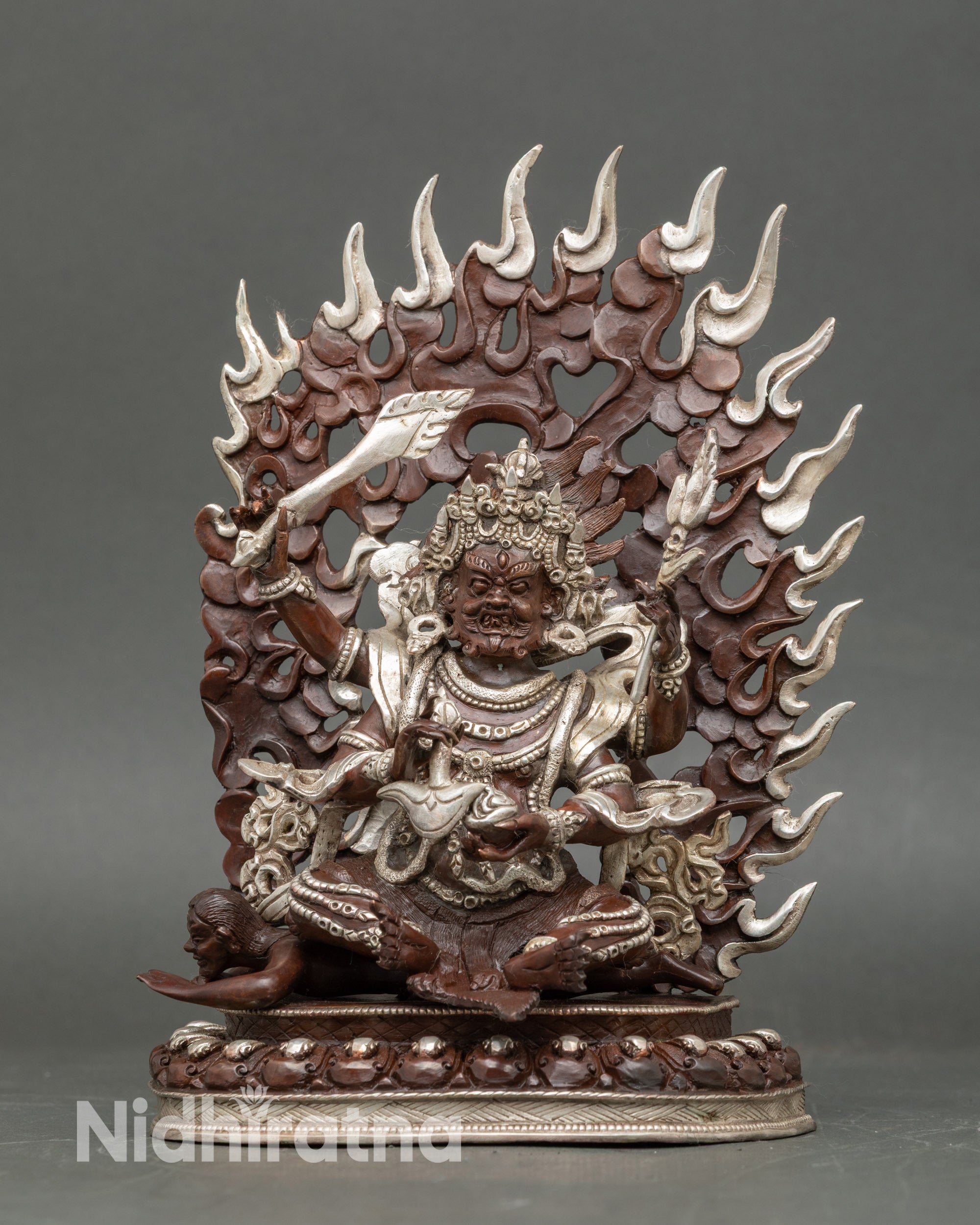 Front view Chaturbhuja Mahakala statue in oxidized copper with silver-plated details, handcrafted in Nepal