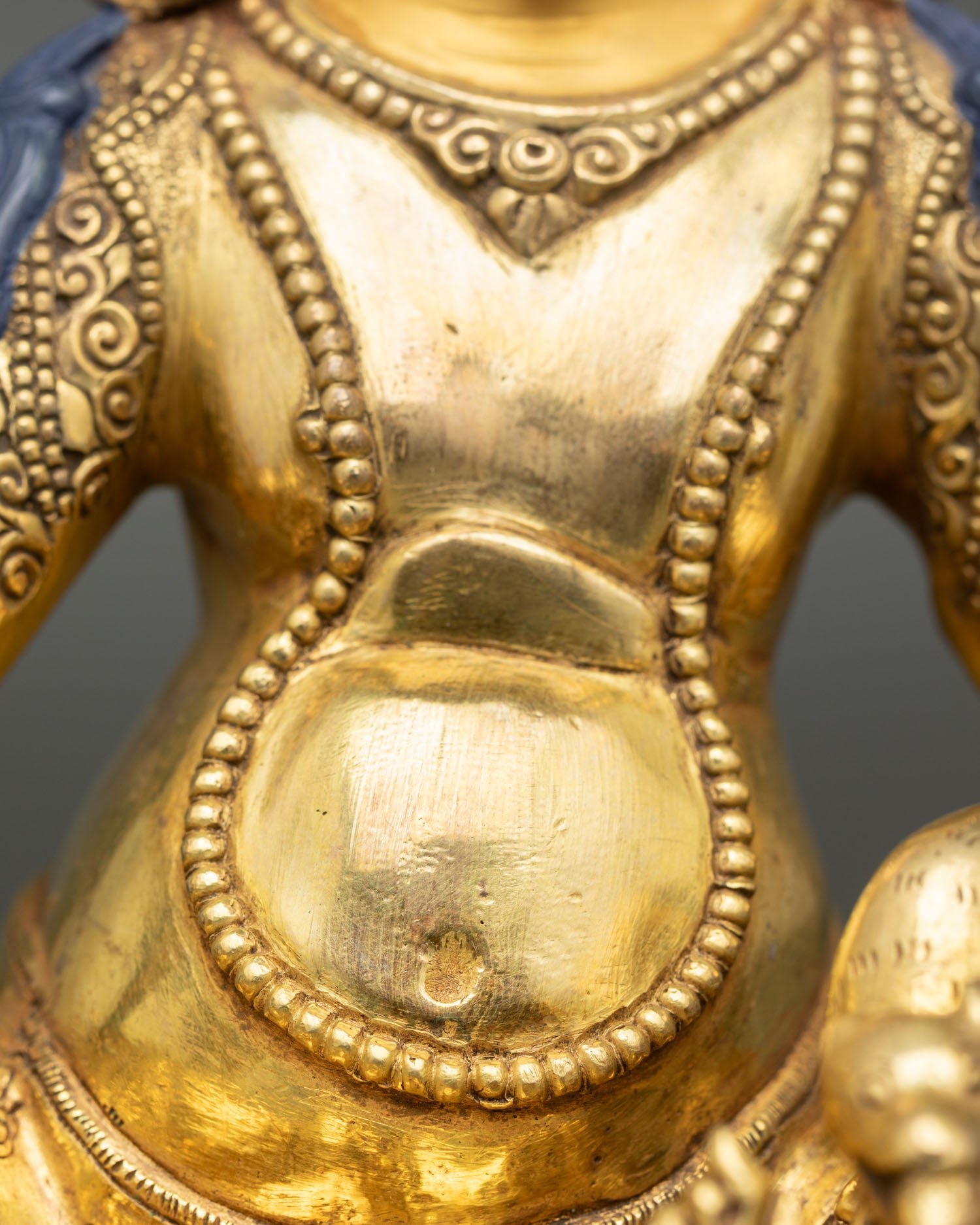 Golden Dzambhala Statue for Wealth and Spiritual Abundance