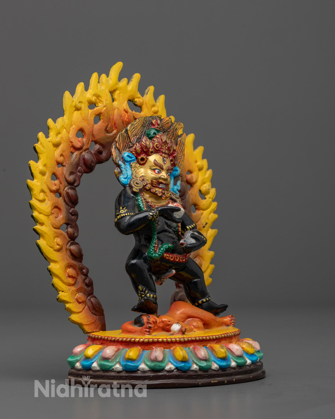 Fierce expression of Black Dzambhala deity of wealth and prosperity on premium copper statue