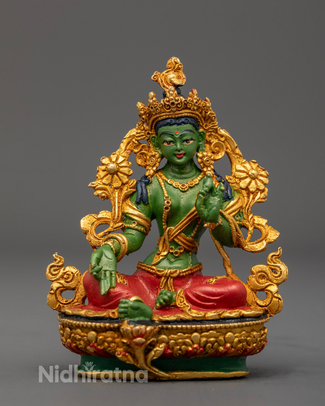 Finely hand-painted Green Tara statue with gold-plated finish and green-painted body decorated with rich acrylic colors for spiritual guidance and protection