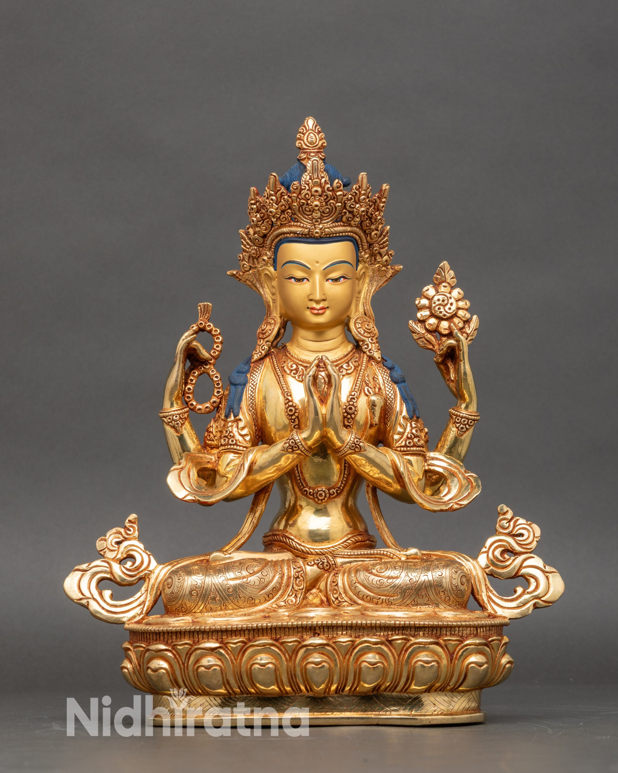 Four-Arm Chenrezig statue handmade in Nepal with gold fire-gilded finish and 24K gold face