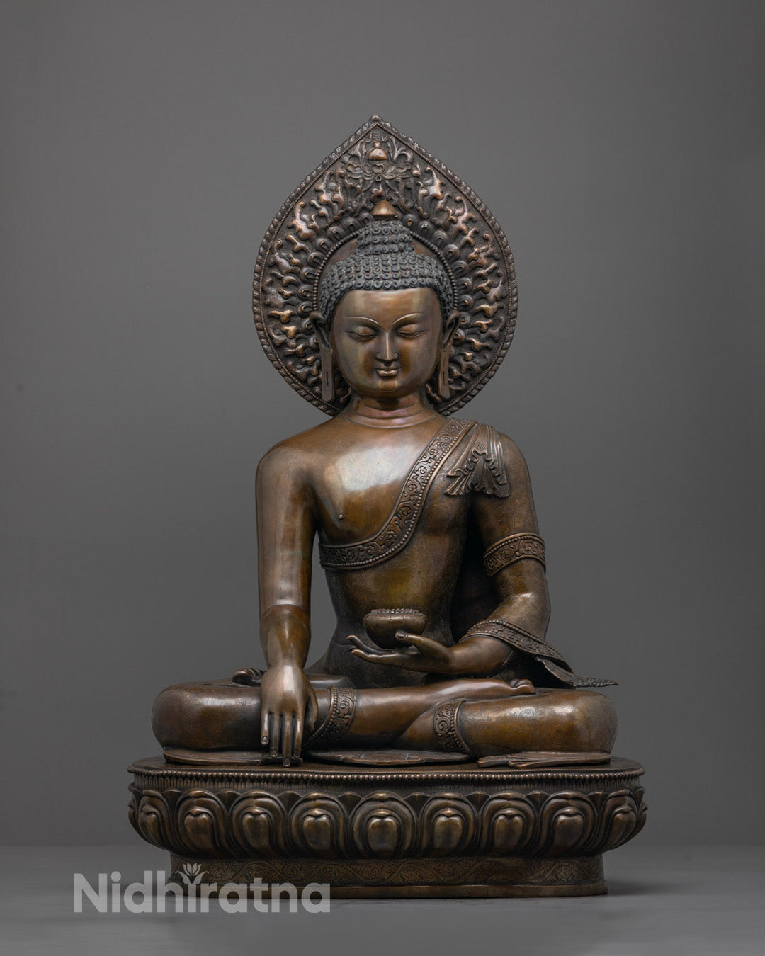 Front-image of Meditative Shakyamuni Buddha statue with oxidized copper finish