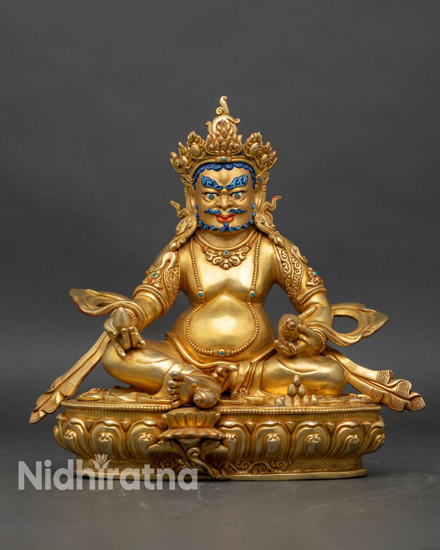 Front view of Dzambhala statue, copper with 24K gold fire-gilding, Nepalese craftsmanship