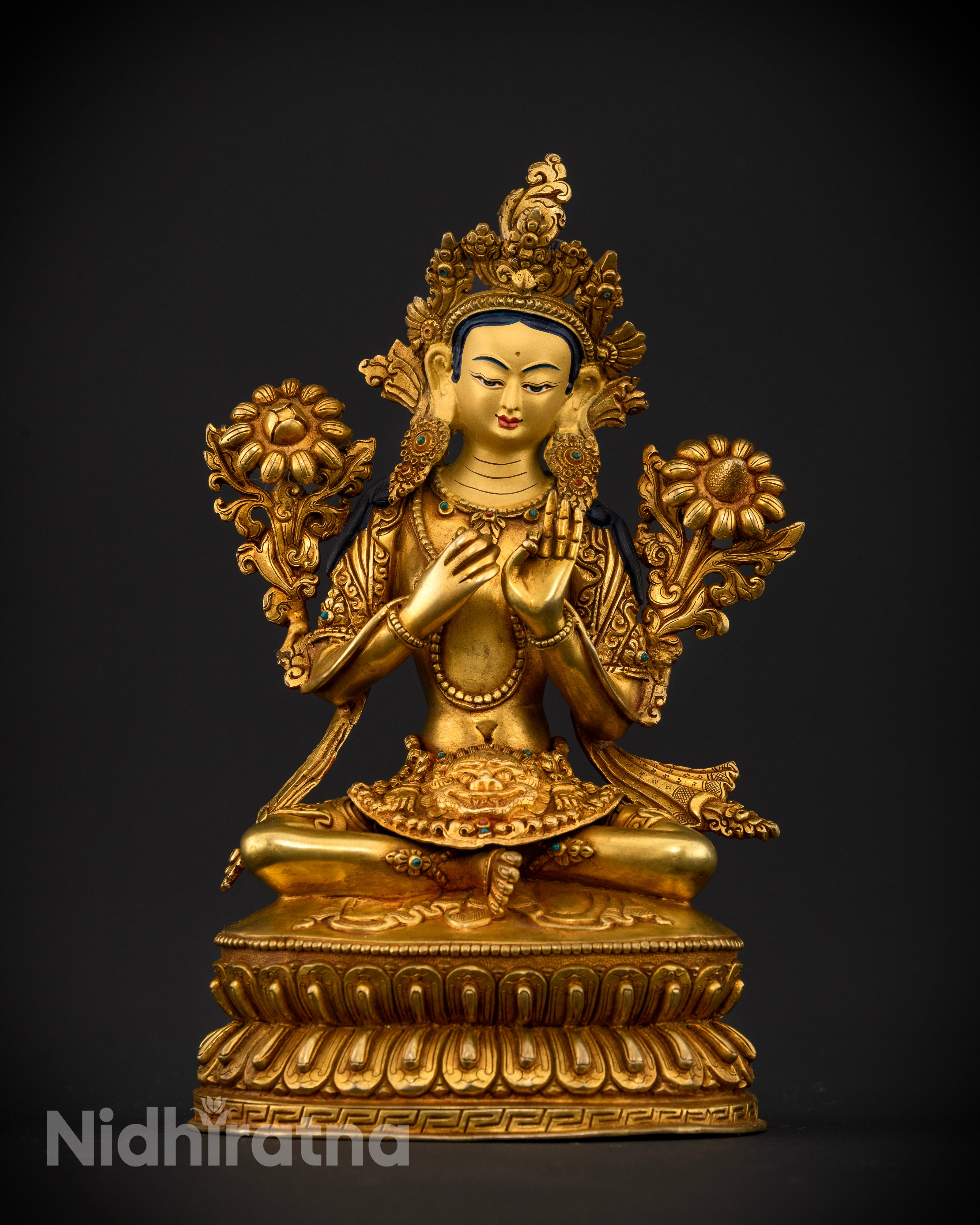 Front view of Green Tara statue gold face semi-precious stones double lotus pedestal Nepal