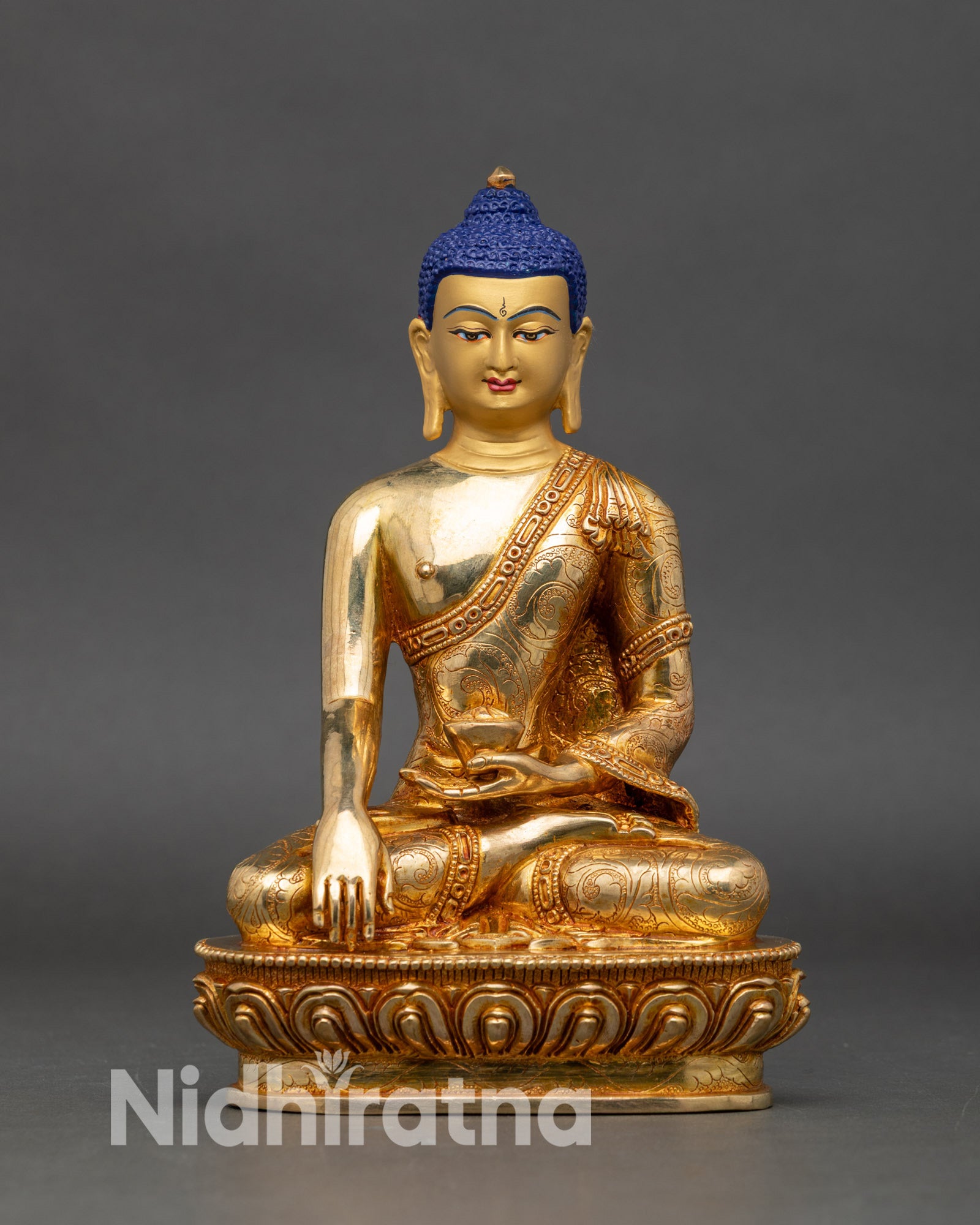 Front view of Shakyamuni Buddha statue, handcrafted Nepalese copper 24K gold meditation figure