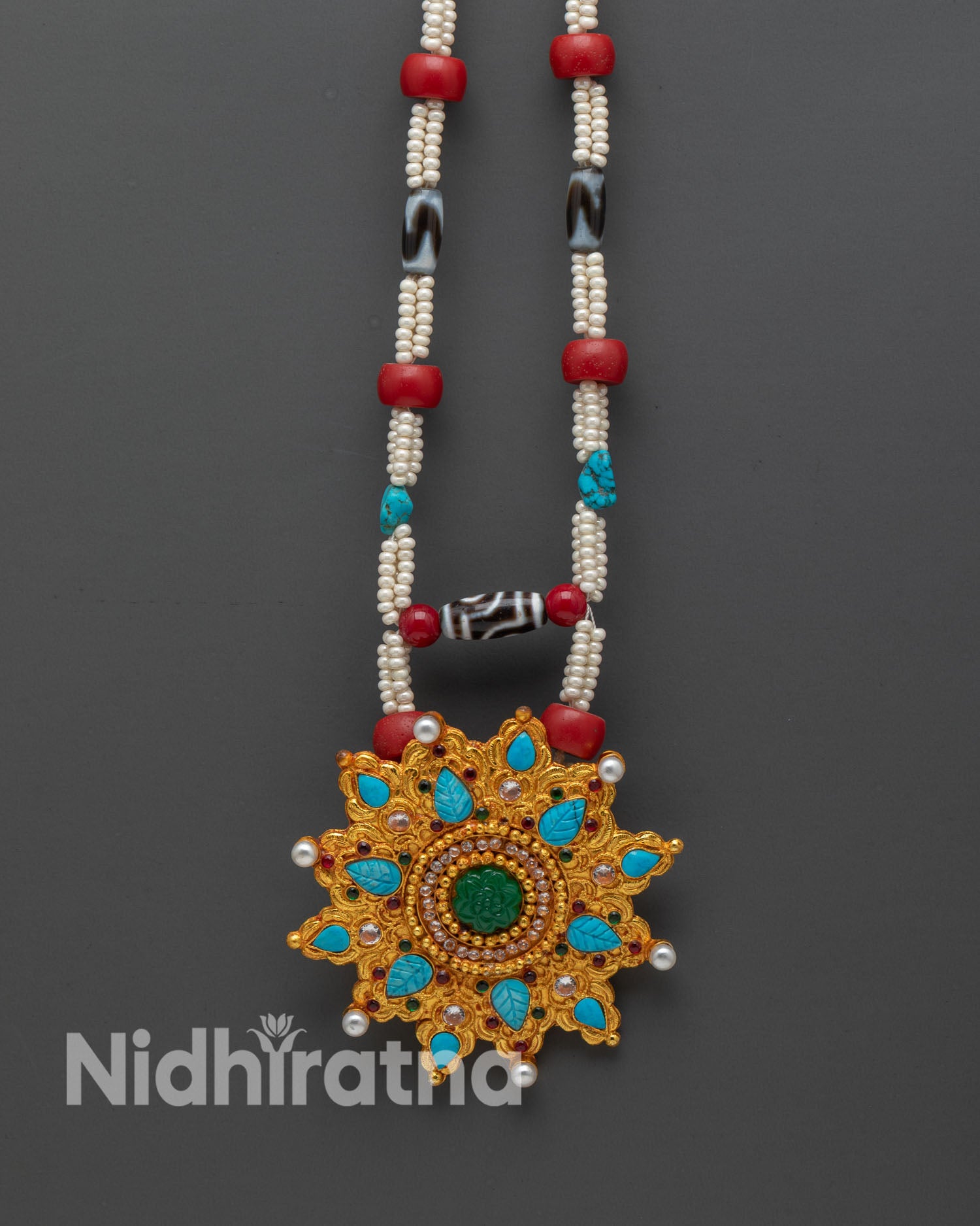 Front view of Tibetan Ghau Mala Necklace hand-carved 24k gold-plated beads turquoise coral Dzi emerald ruby