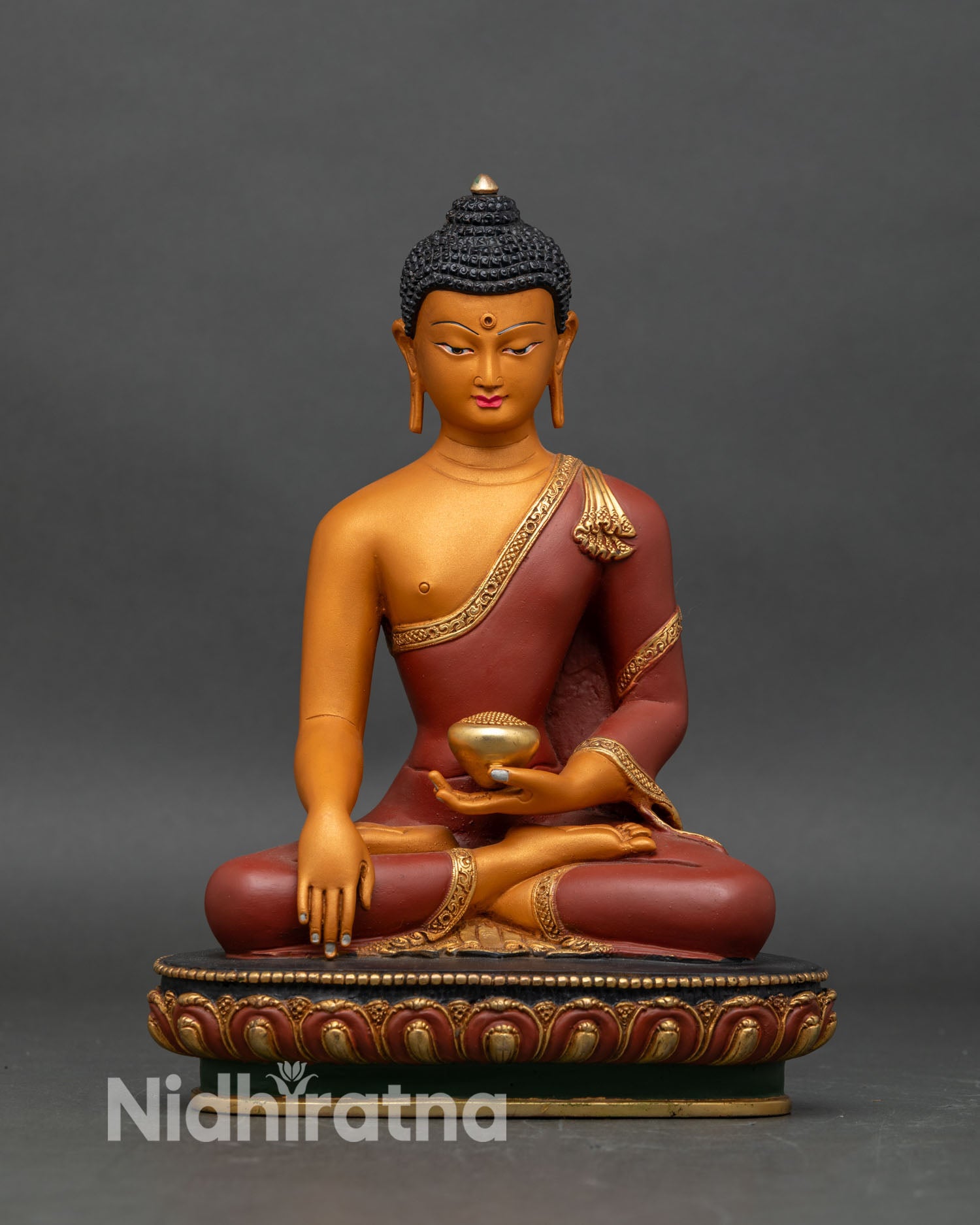 Front view of Shakyamuni Buddha statue, handcrafted copper with gold-gilded finish