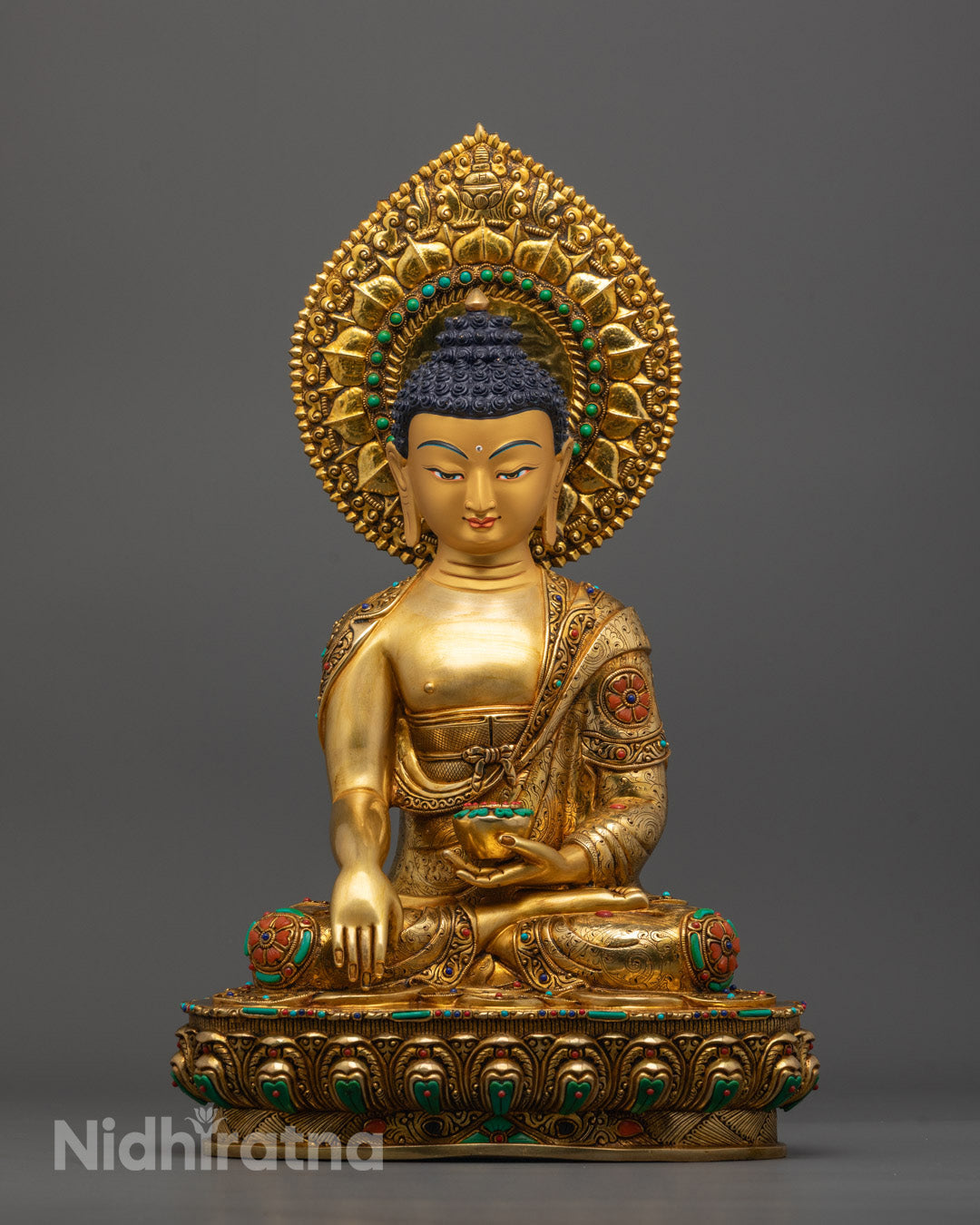 Front-view of Hand-carved Buddha Shakyamuni statue with 24k fire gold gilding