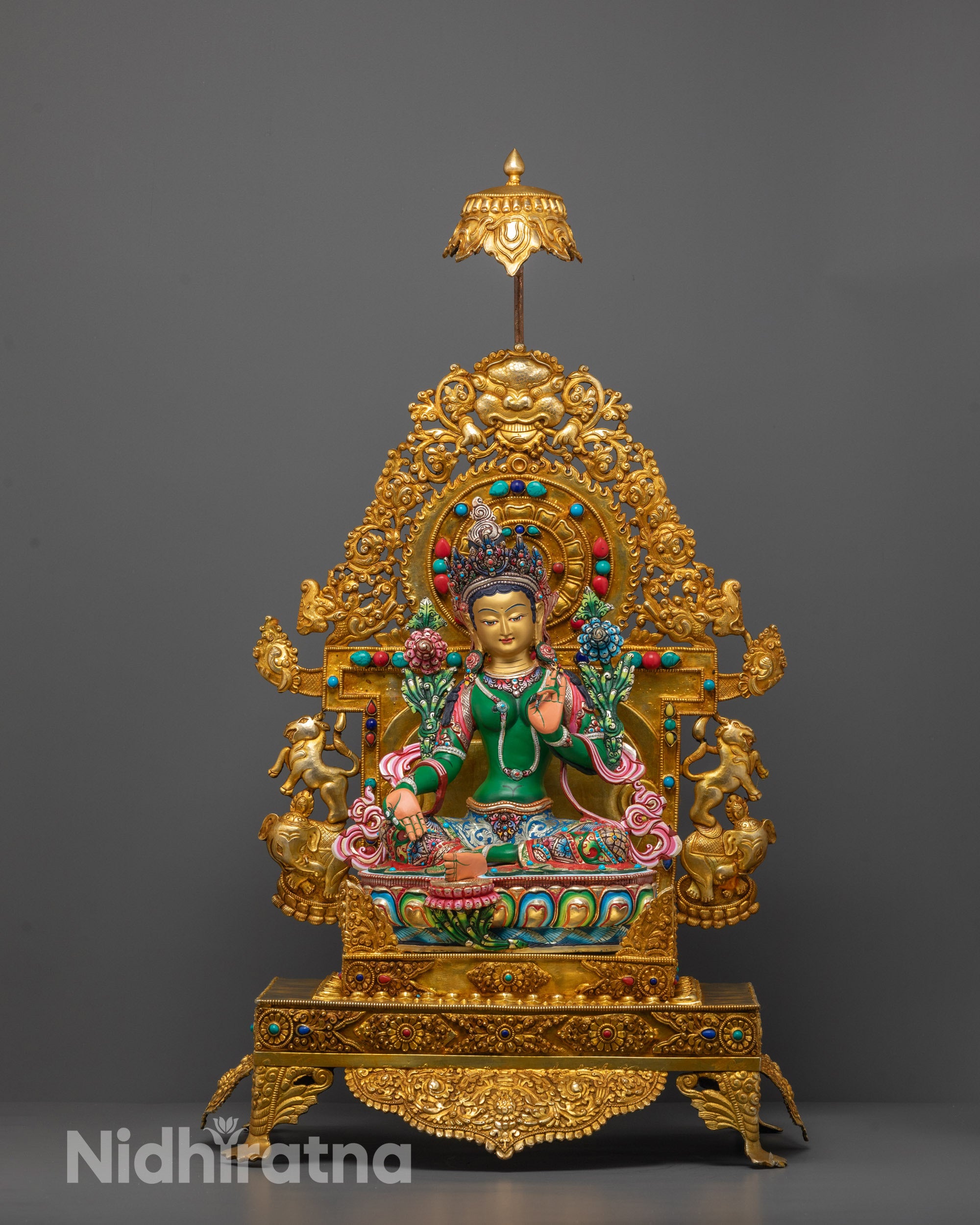 Front-view of Hand-carved Green Tara Statue seated on lotus throne with 24k gold plated base