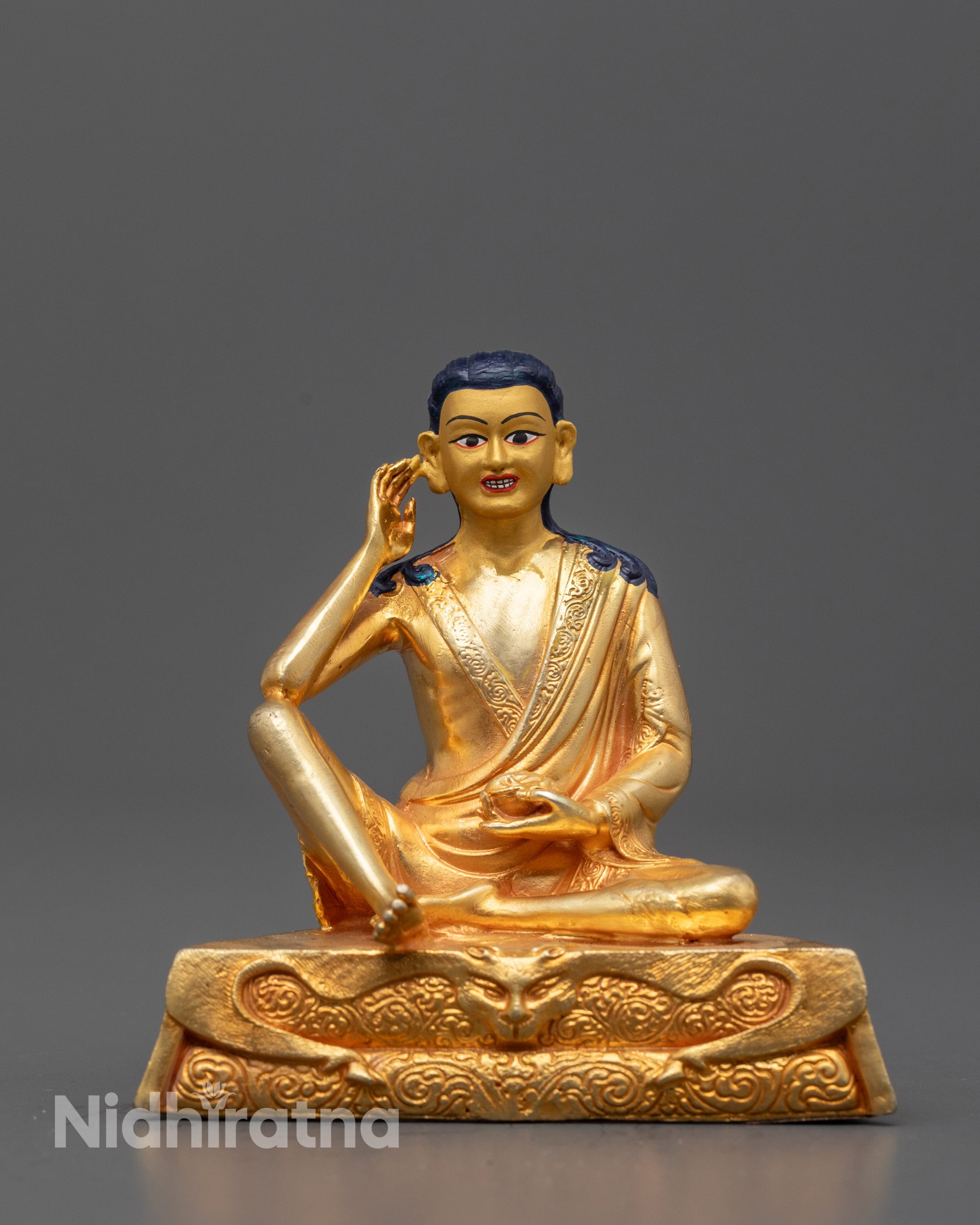 Front-view of Milarepa Statue crafted from 24k gold plated copper, depicting the Tibetan yogi