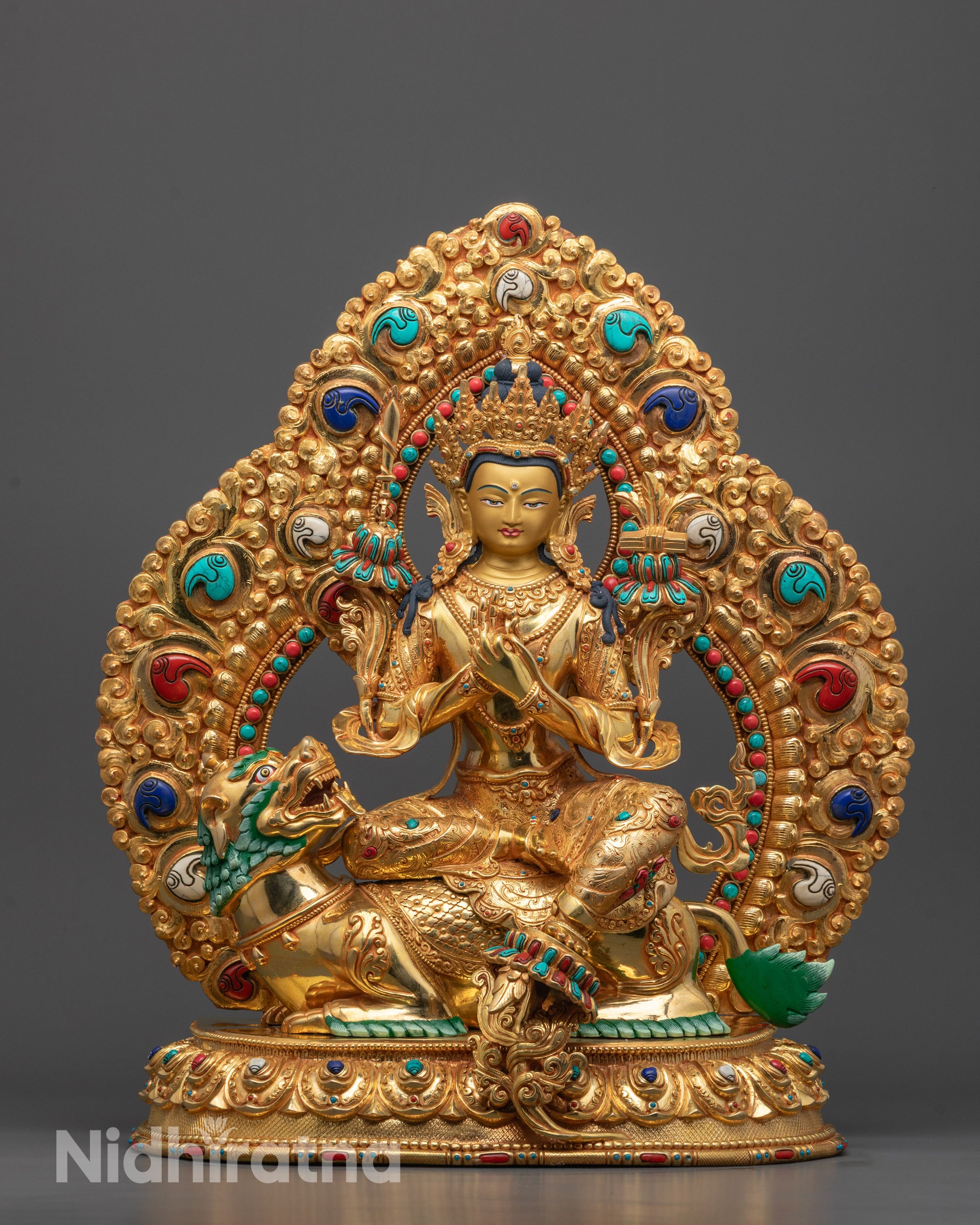 Front View of Hand-Carved Manjushri Statue Seated on Snow Lion