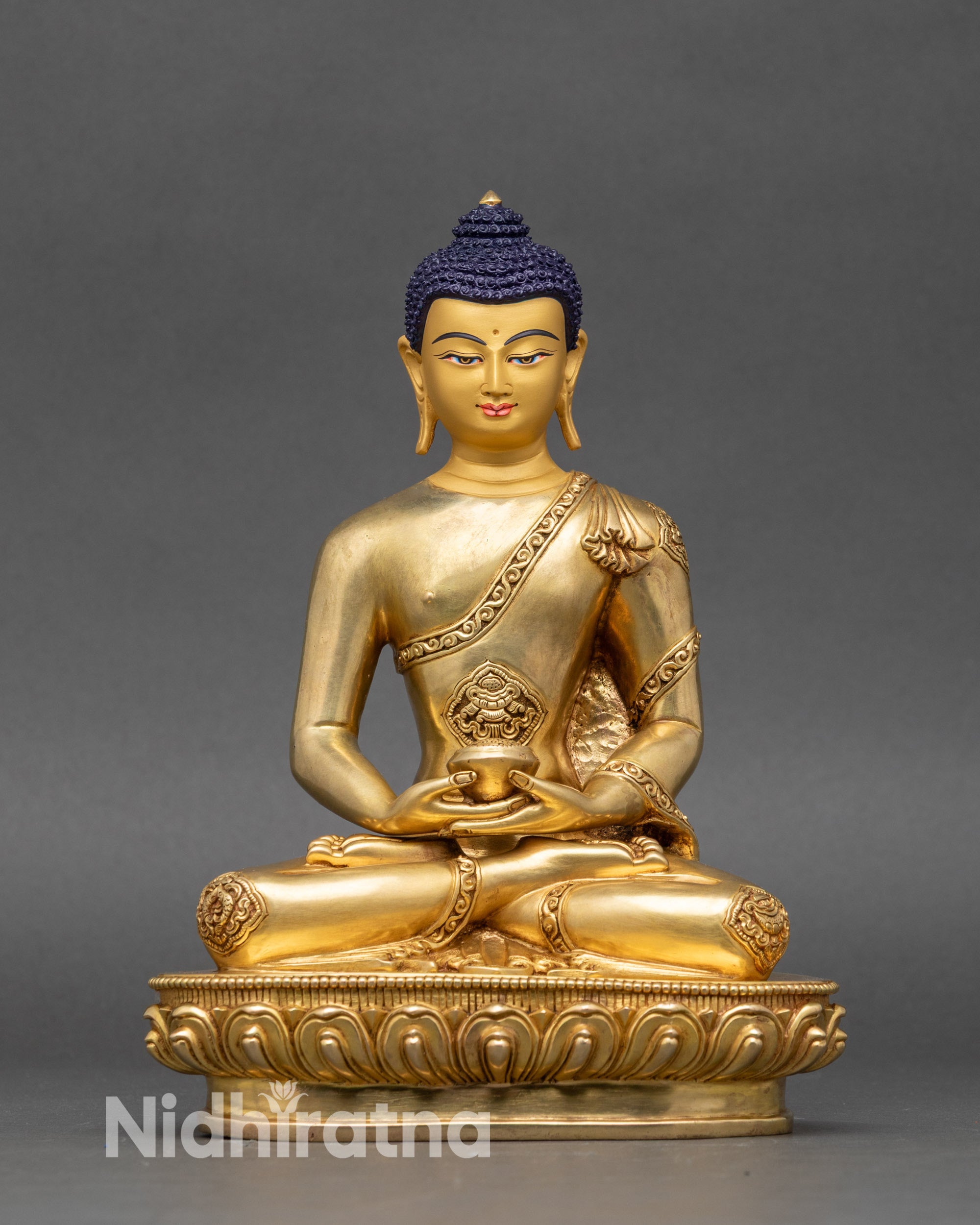 Front view Amitabha Buddha statue gold-painted face lotus pedestal meditation pose