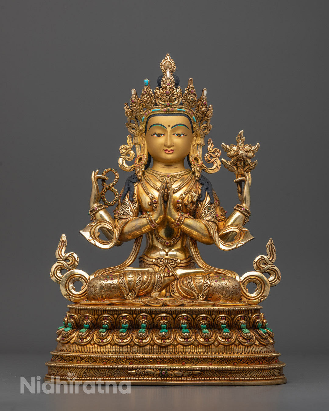 Front view Avalokiteshvara Mantra Sculpture with 24K gold-gilded face and lotus throne