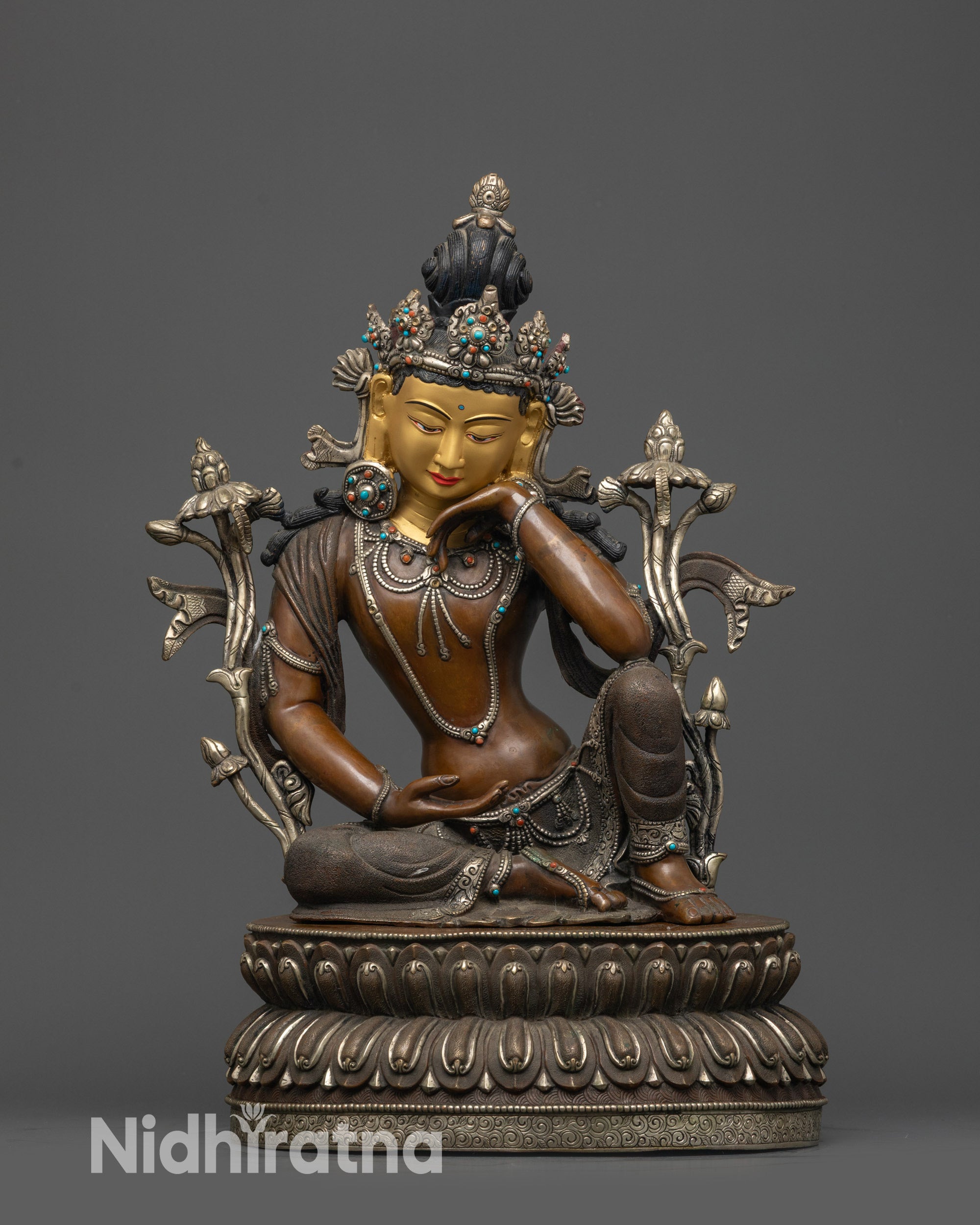 Front view Calm Avalokiteshvara Statue with oxidized copper and gold-gilded face