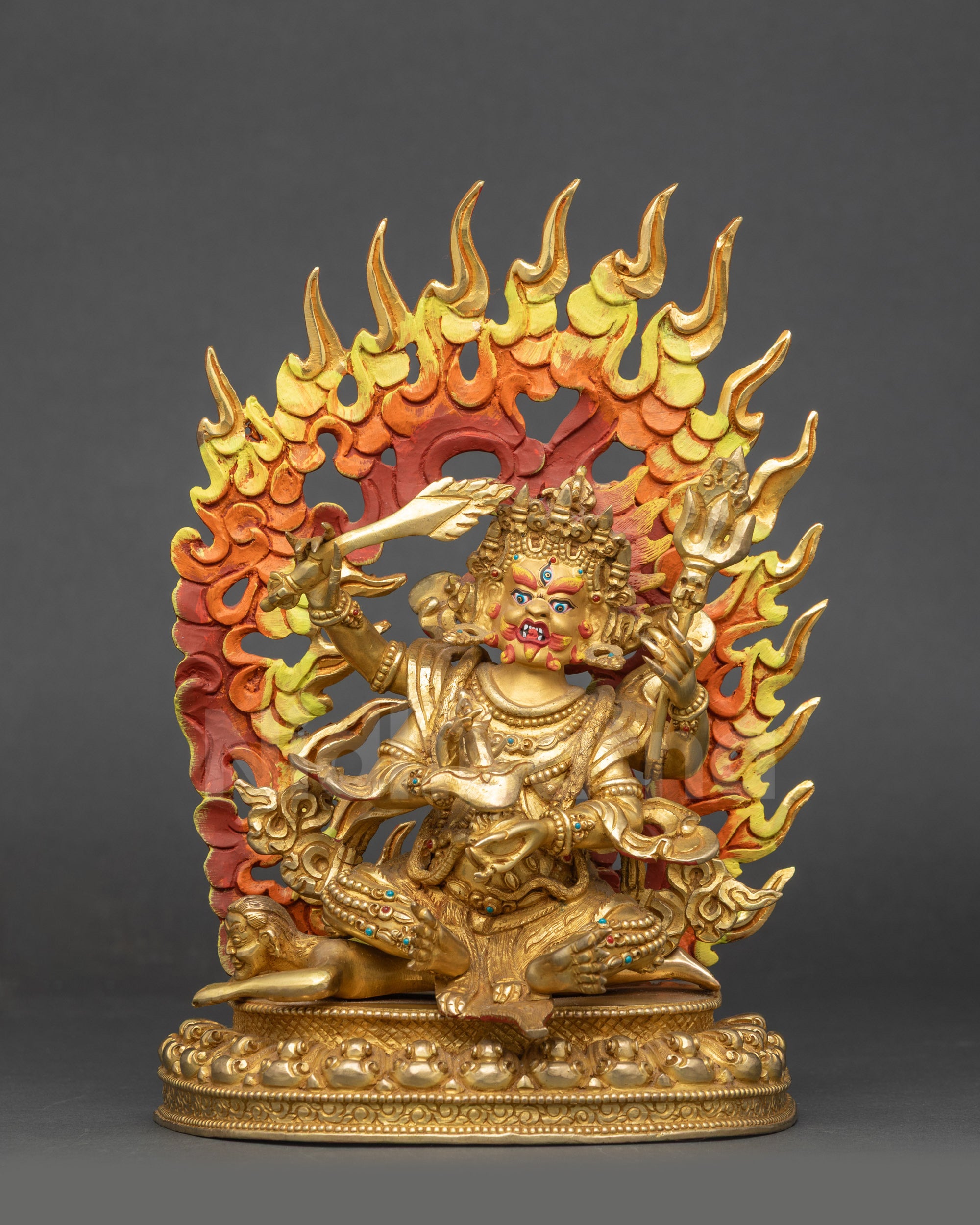 Front view Chaturbhuja Mahakala statue gold fire-gilded copper four-armed protector