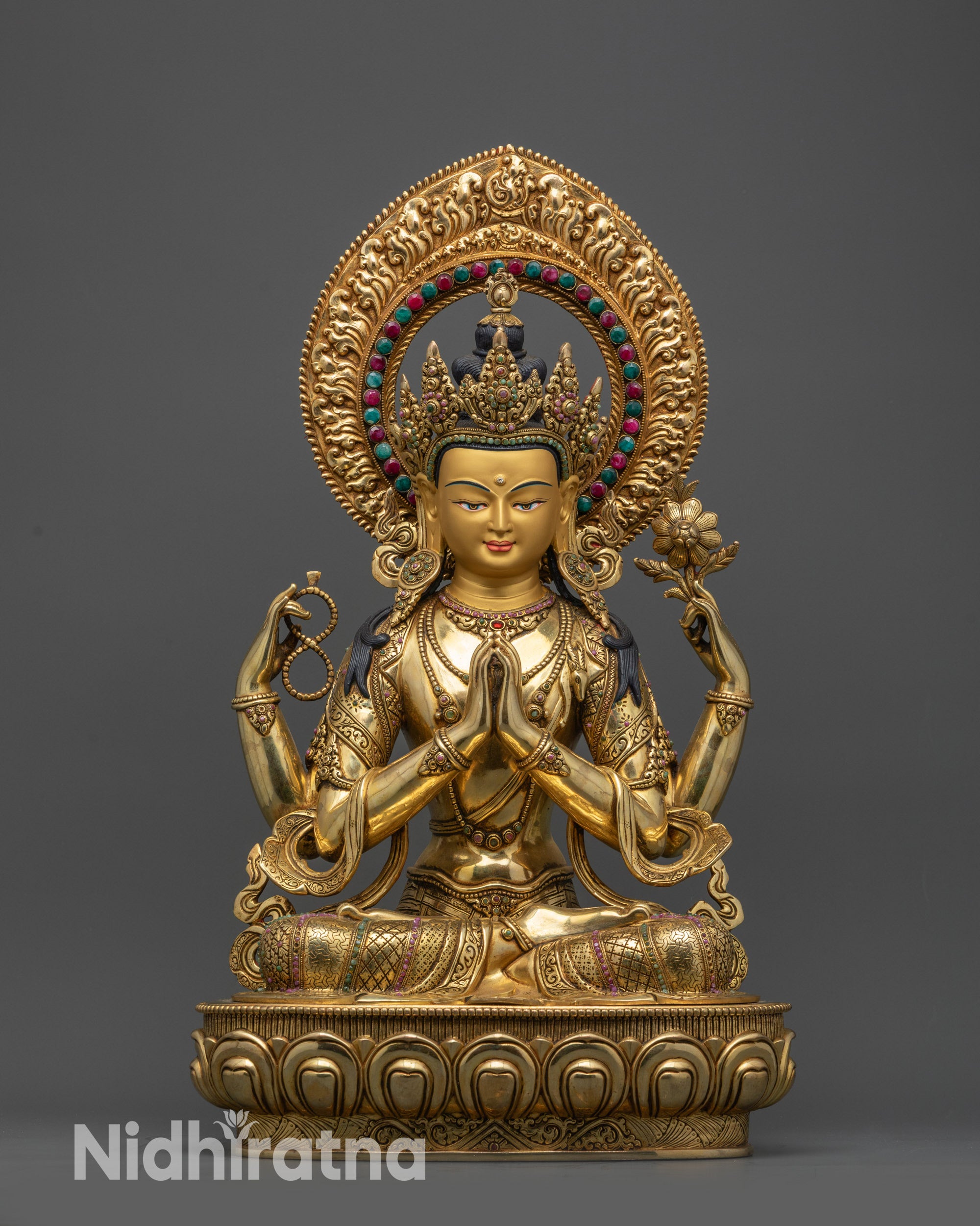 Front view Chenrezig statue on lotus throne with gold-gilded face and semi-precious stones