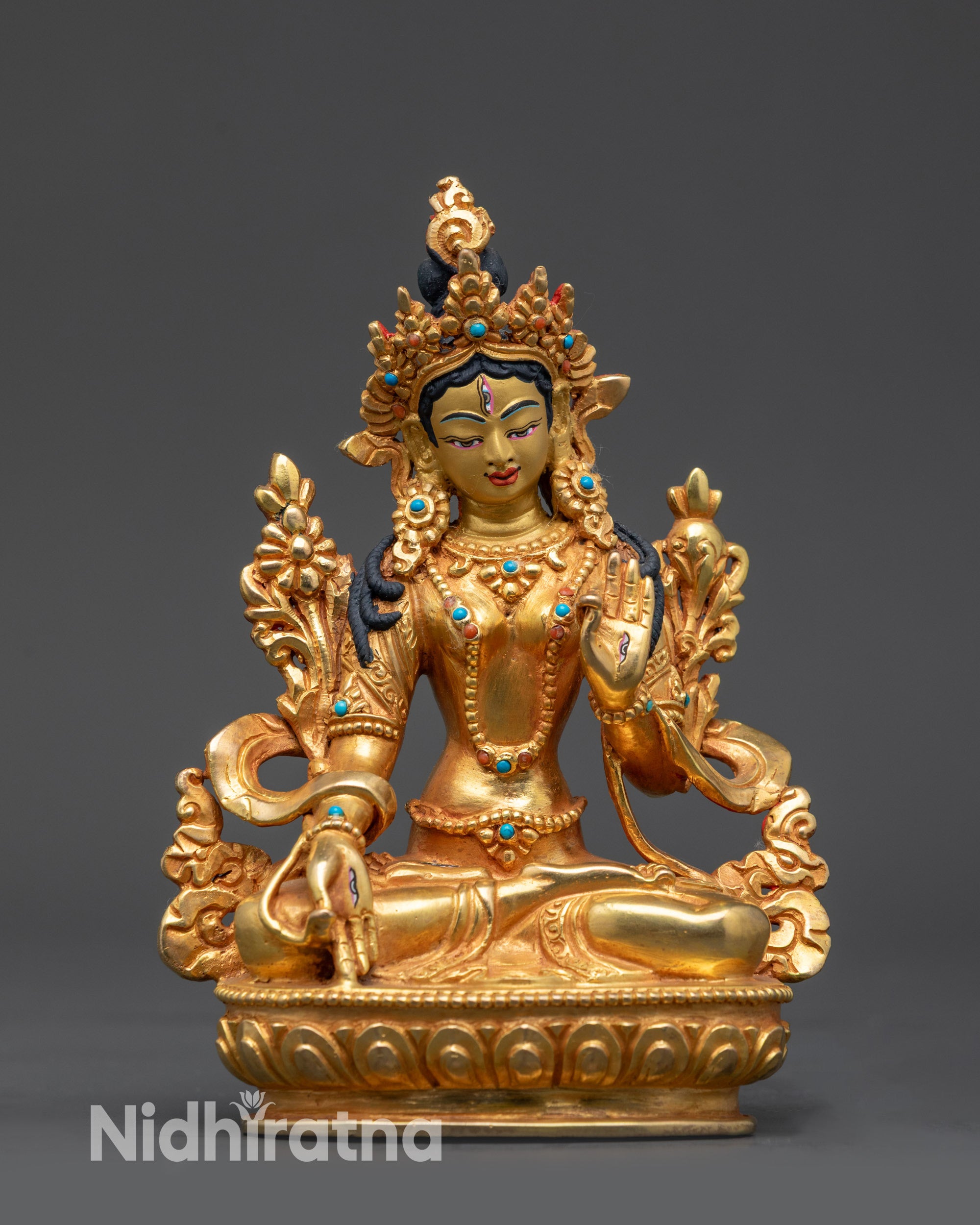 Front view Divine Sapta Lochani White Tara statue with gold-gilded face and seven eyes