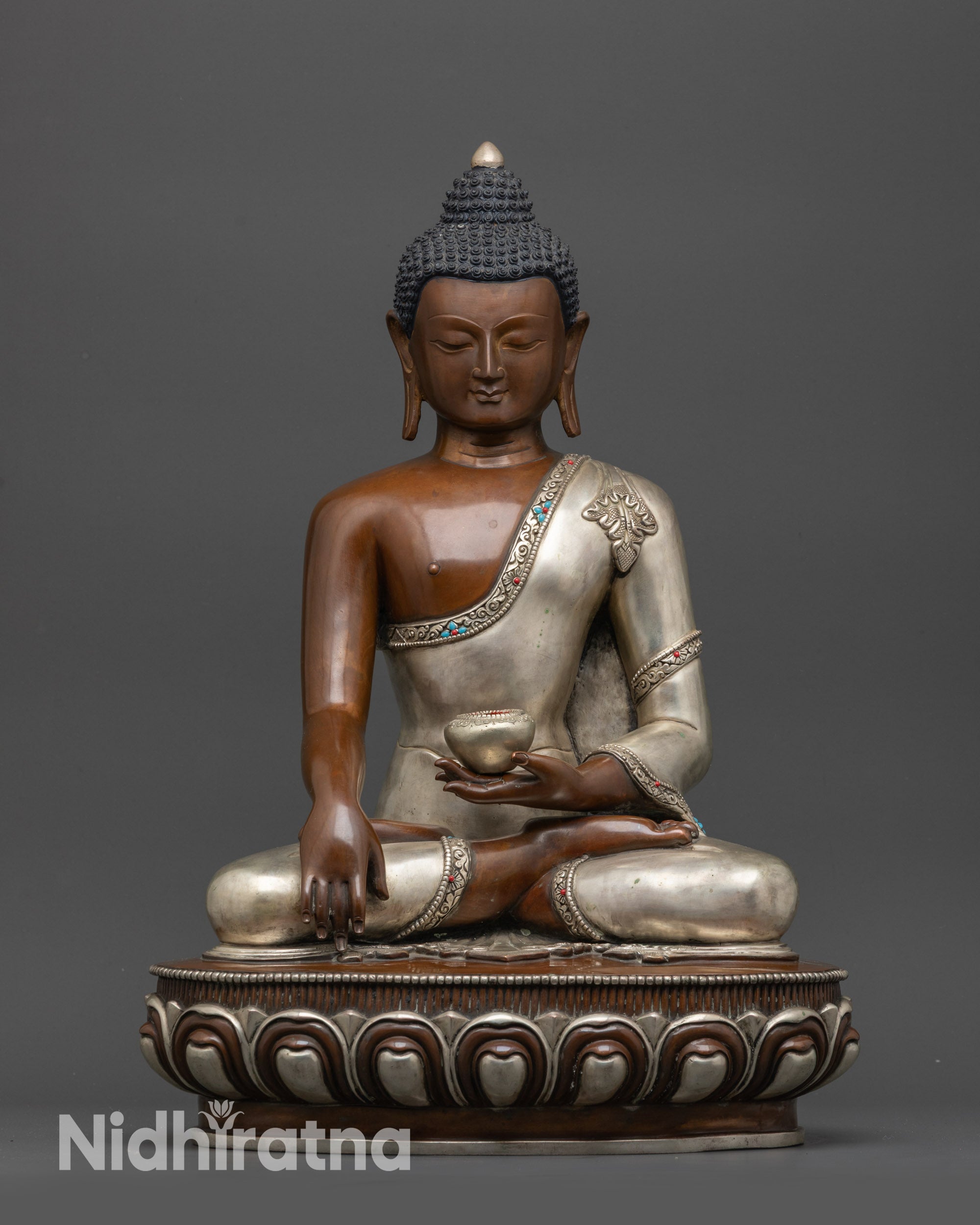 Front view Enlightened One Tathagata Shakyamuni Buddha statue on lotus pedestal