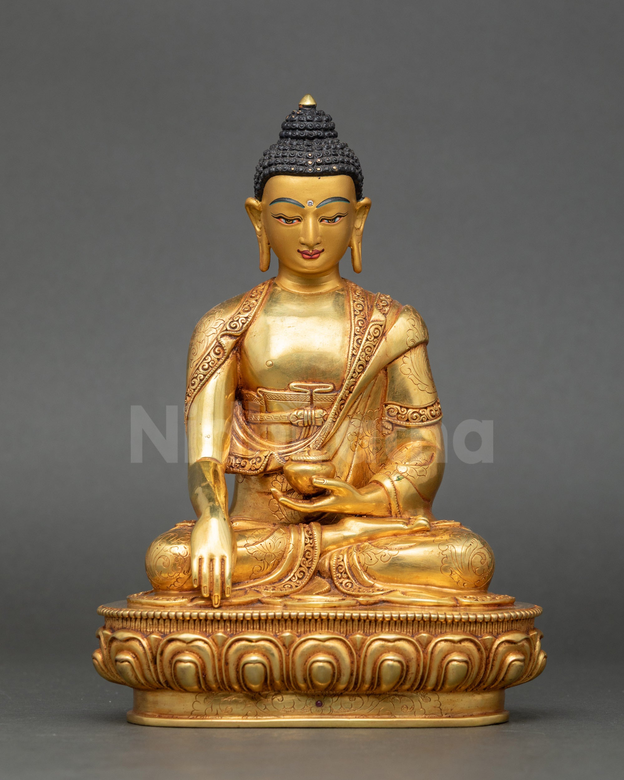 Front view Gautama Shakyamuni Buddha statue gold-gilded copper meditative posture Nepal