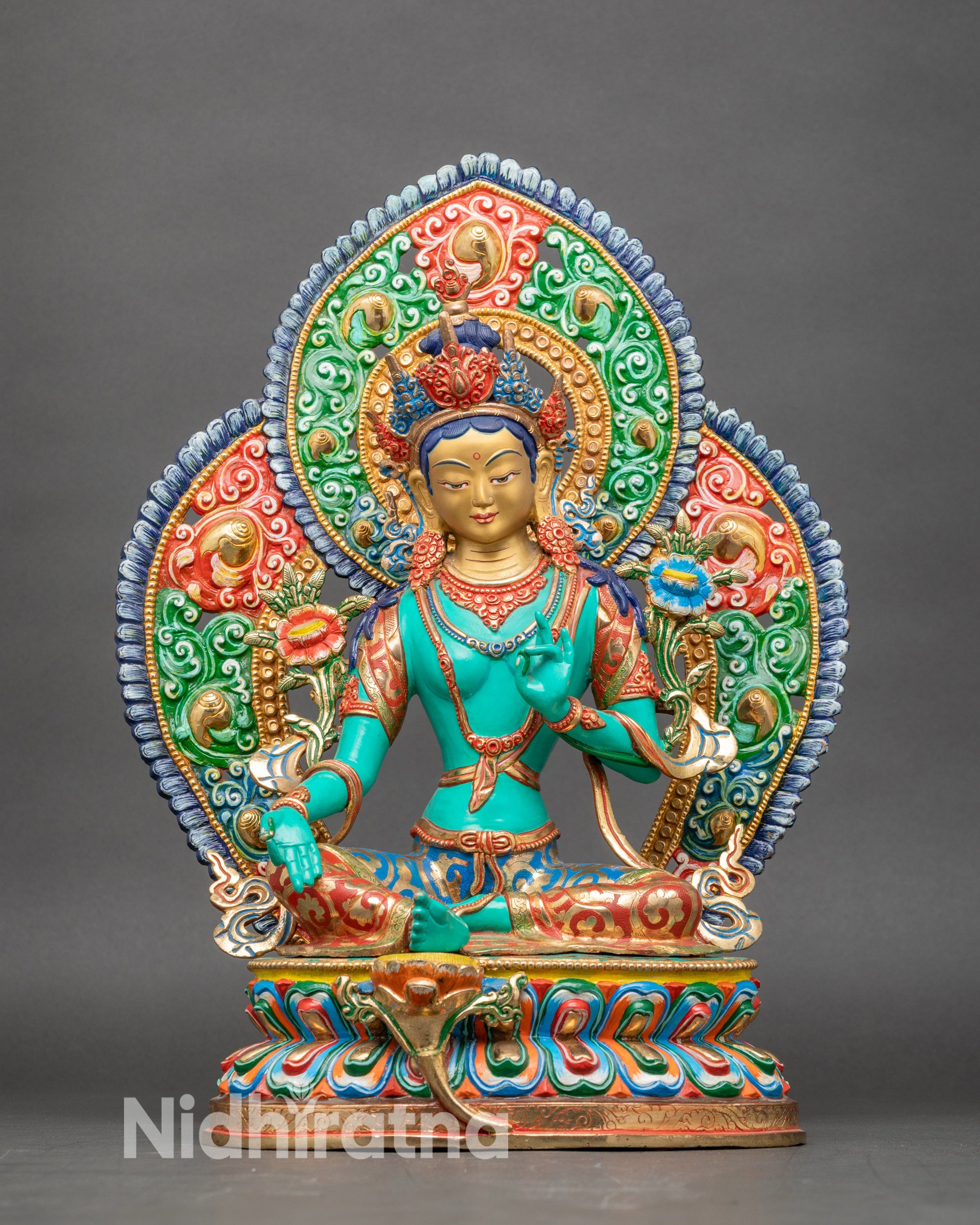 Front view Green Tara statue copper with gold-painted face and hand-painted lotus pedestal