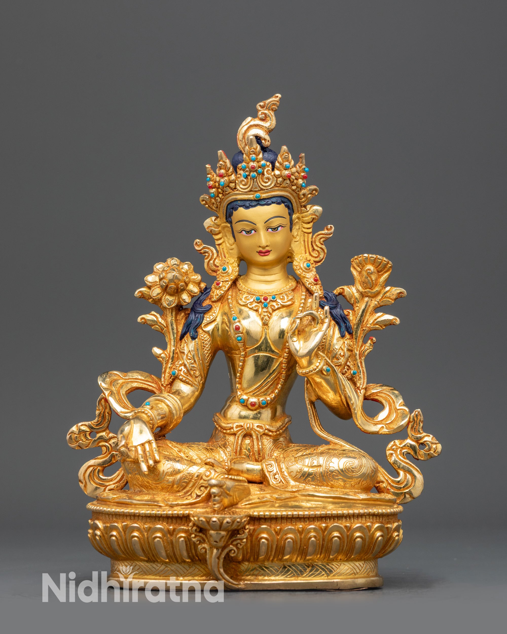Front view Green Tara statue from Nepal with gold-gilded face and lotus throne