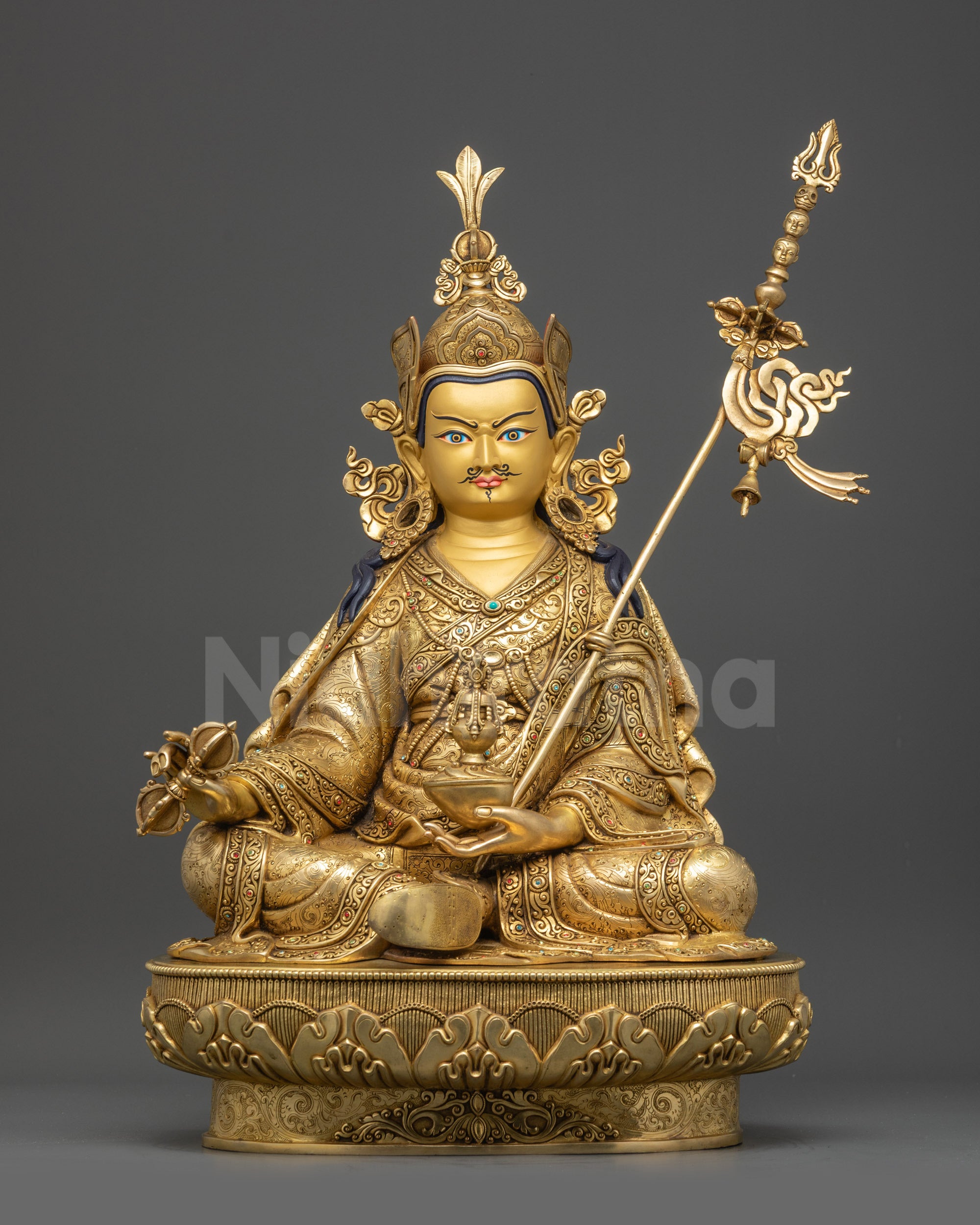 Front view Guru Rinpoche statue on lotus seat with gold fire-gilded base