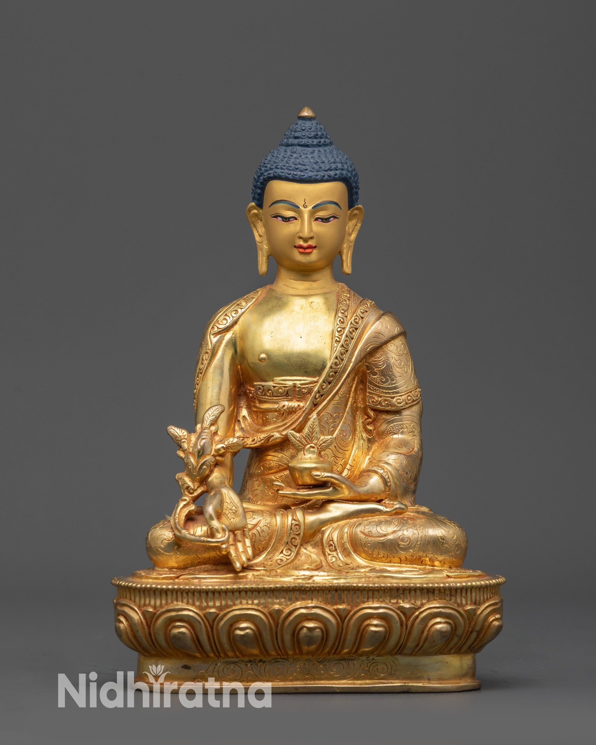 Front view Handcrafted Medicine Buddha statue with gold-gilded face and lotus seat
