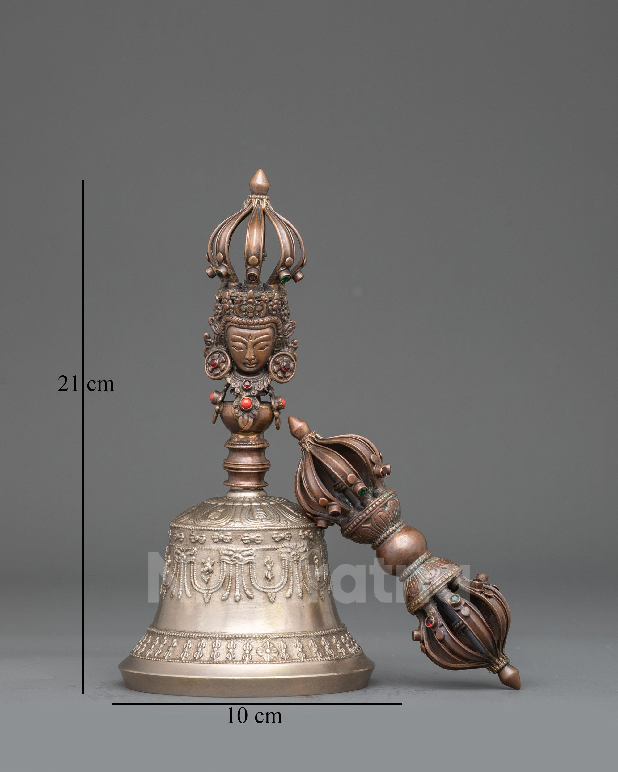 Front view Himalayan Ghanta and Dorje, bronze bell with oxidized copper handle and carved deity