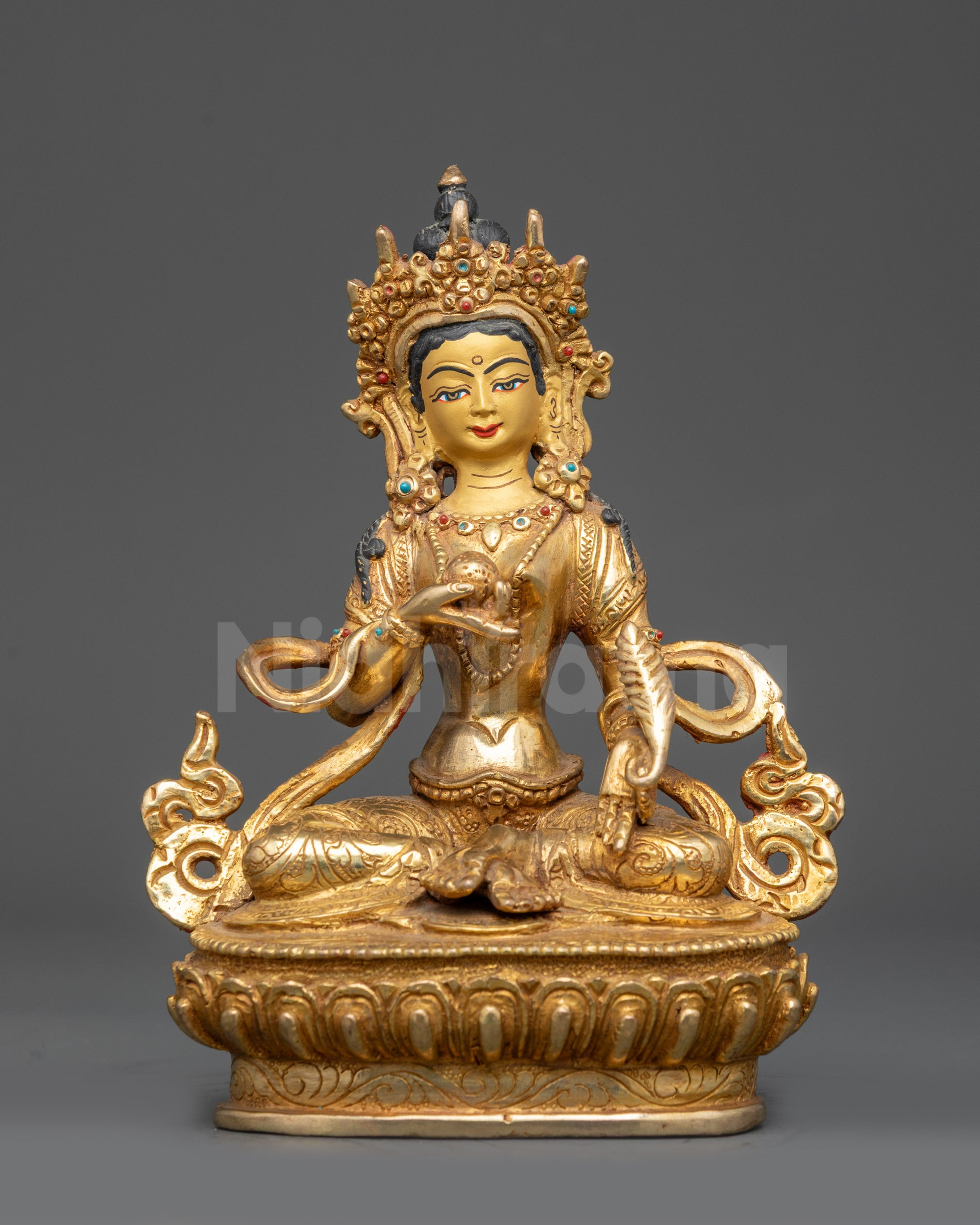 Front view Kshitigarbha Bodhisattva statue on lotus pedestal with gold-gilded face