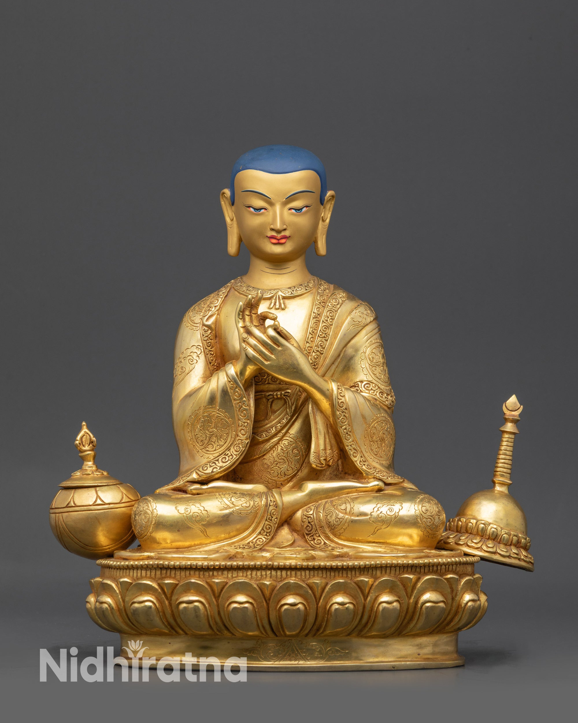 Front view Lama Atisa Statue on gold-gilded copper base, lotus posture and dharmachakra mudra