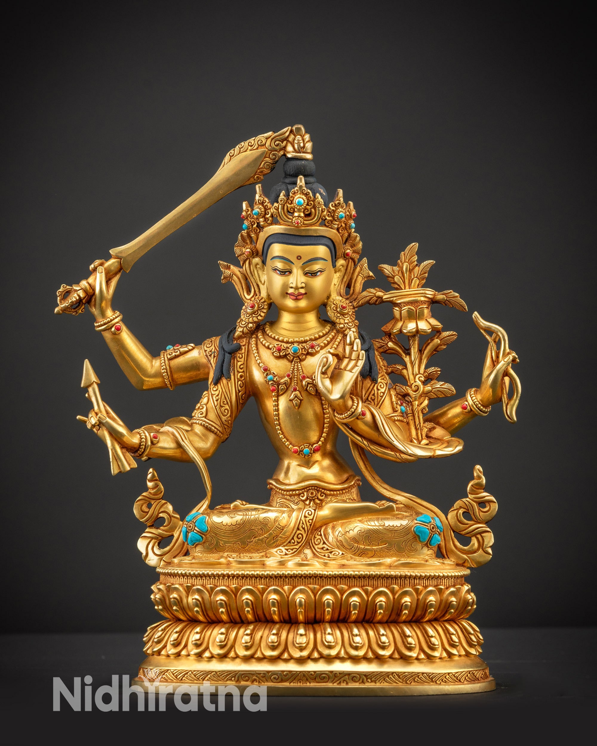 Front view Maha Manjushri statue with 24K gold-gilded face and detailed semi-precious stones