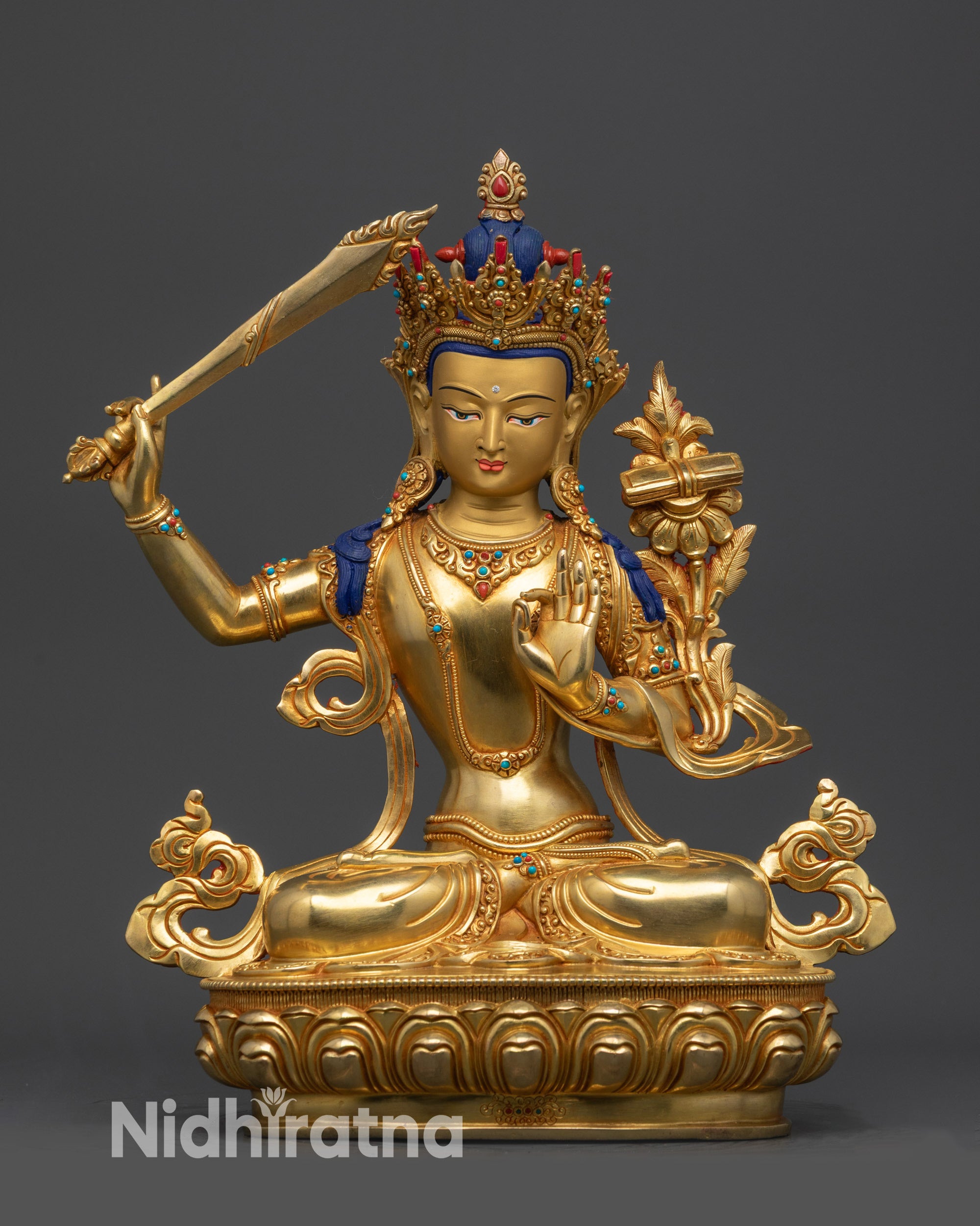 Front view Manjushri Bodhisattva statue with gold-gilded face and lotus pedestal