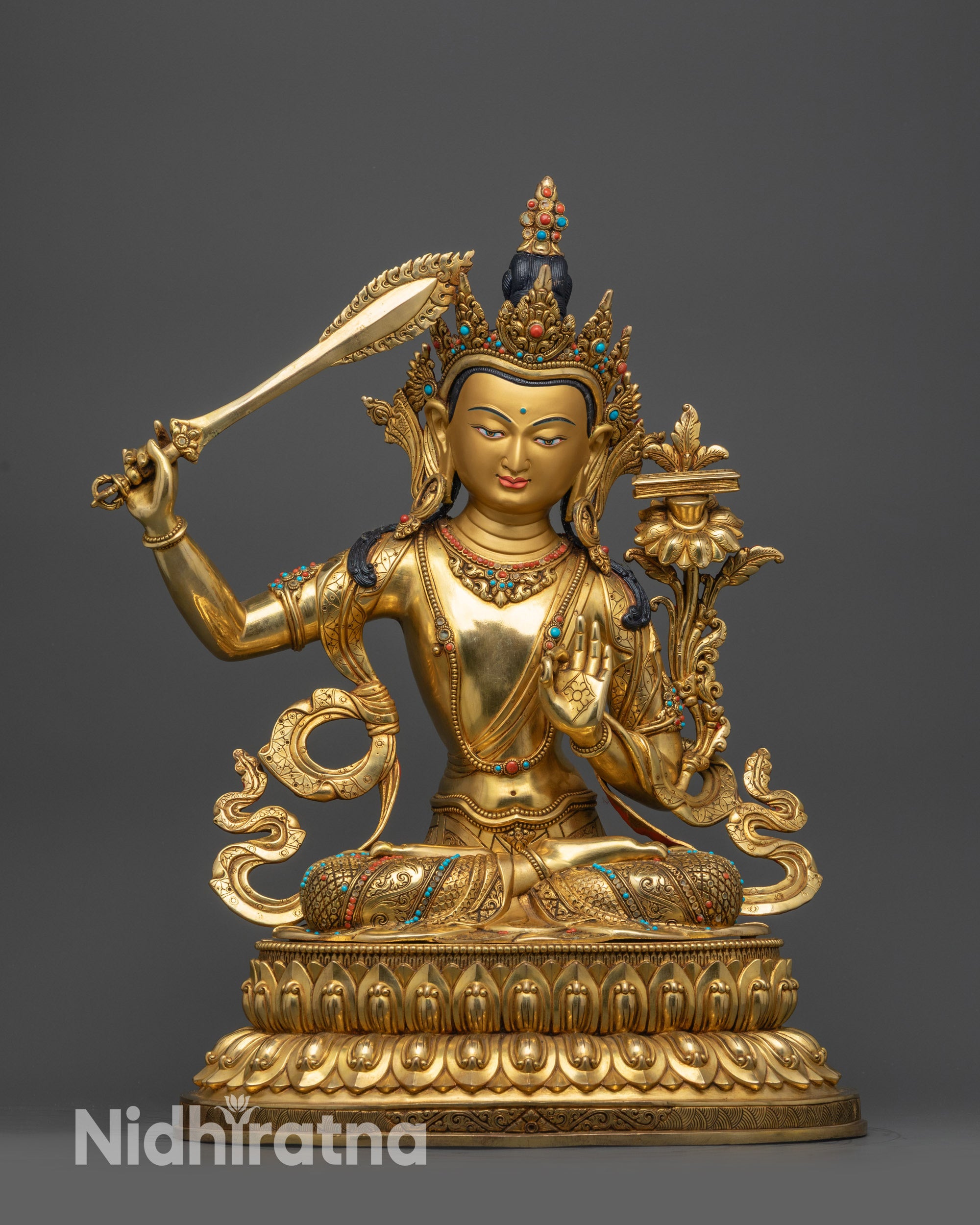 Front view Manjushri Statue with 24K gold face and semi-precious stones on lotus throne