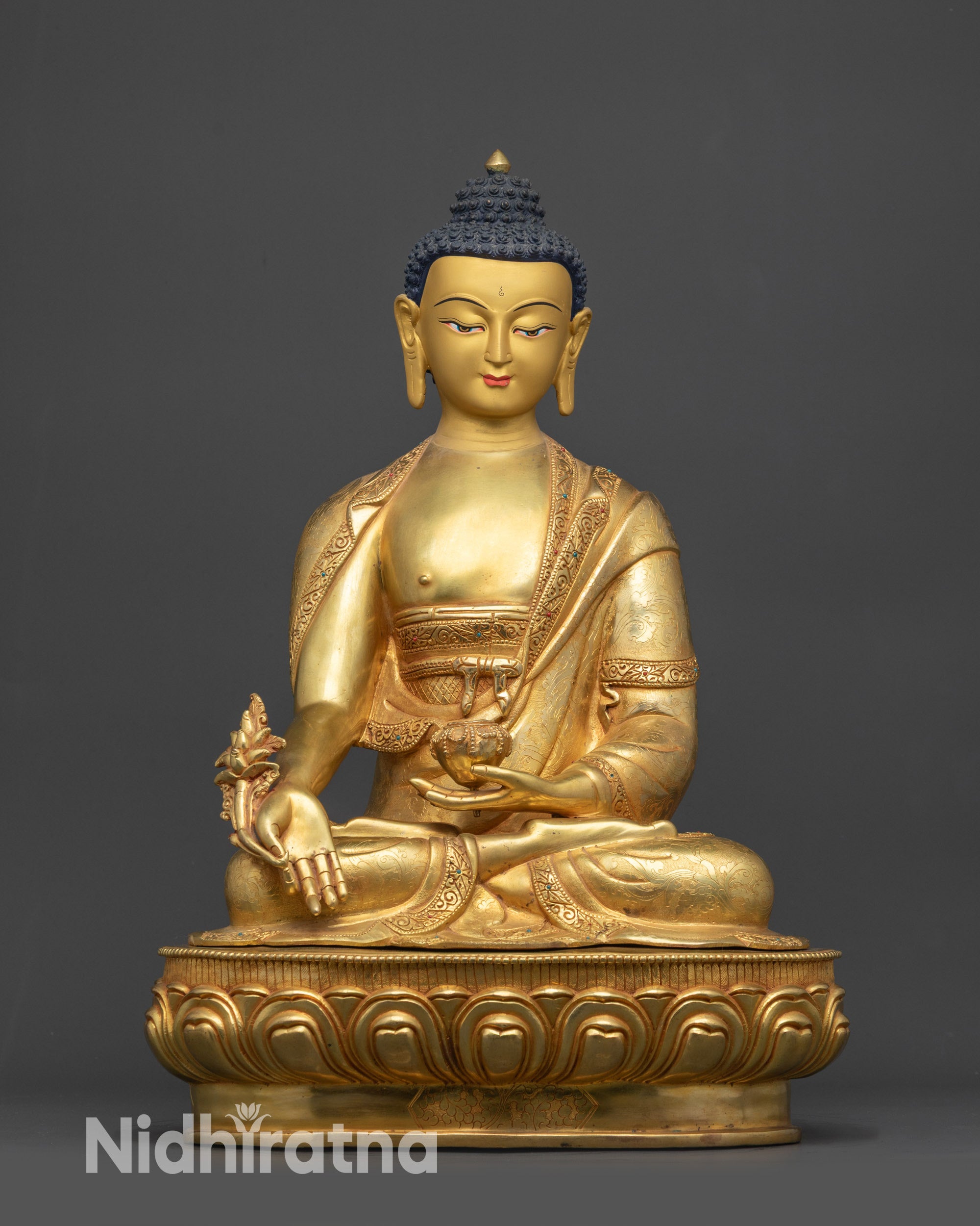 Front view Medicine Buddha Bhaisajyaguru Statue on lotus seat with gold fire-gilded base