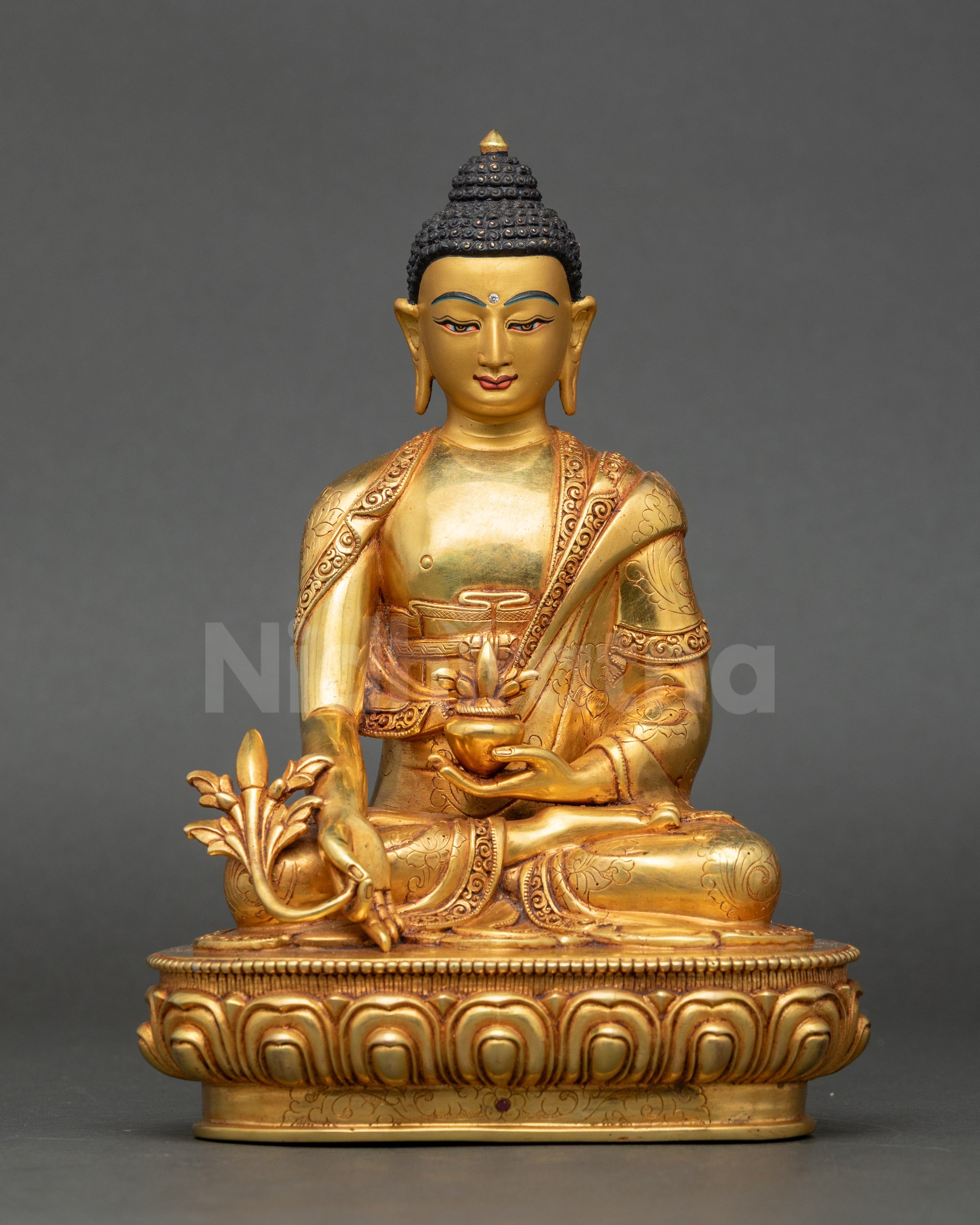Front view Medicine Buddha statue gold-gilded copper seated meditative posture Nepalese art