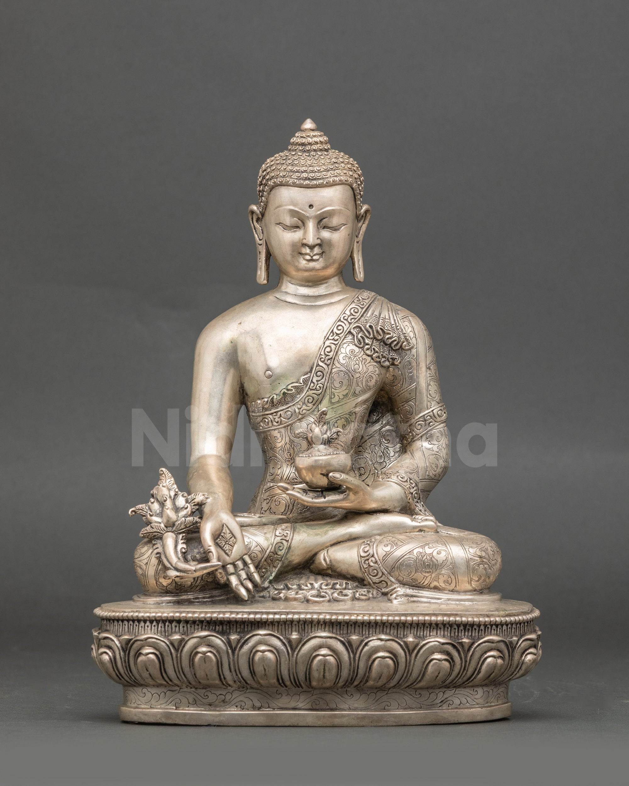 Front view Medicine Buddha statue, silver-plated Nepalese meditation sculpture