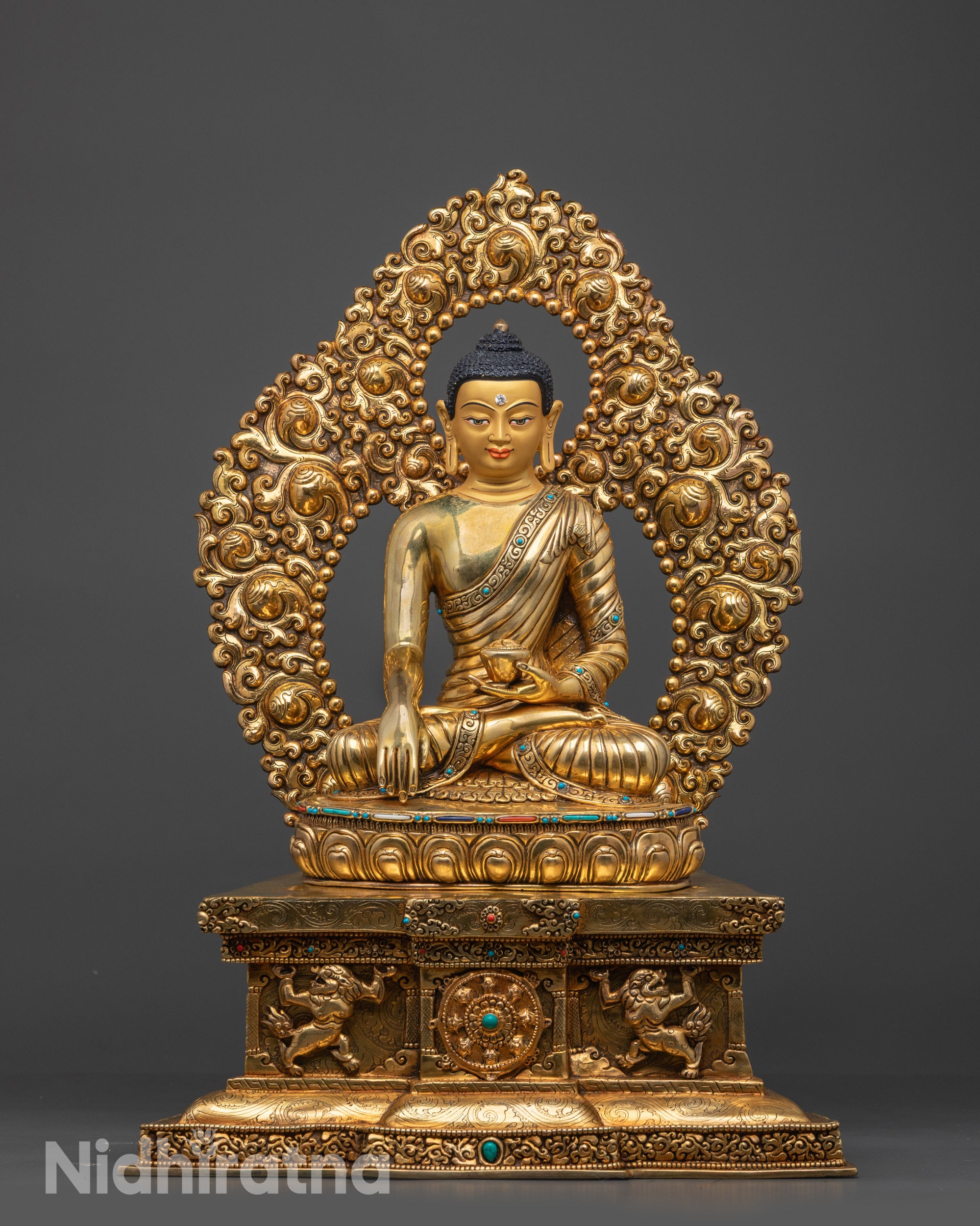 Front view Meditating Shakyamuni Buddha statue with gold-gilded face and lotus seat