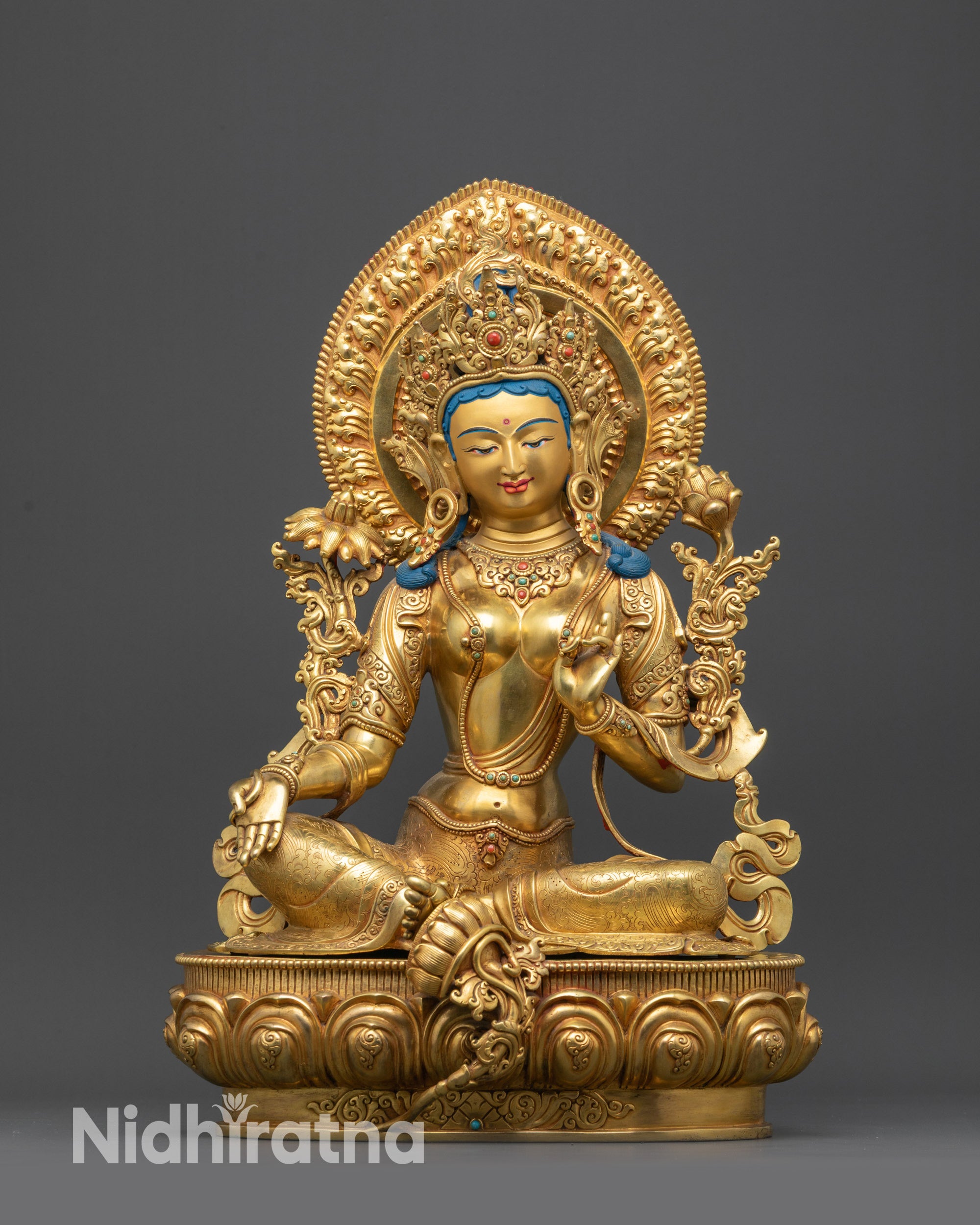Front view Mother Green Tara Statue with gold-gilded face and floral halo